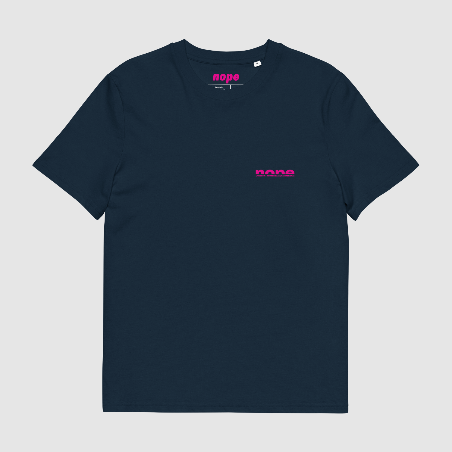 Front view of navy Nope T-shirt with minimalist chest logo in hot pink — streetwear by Mr. Nope