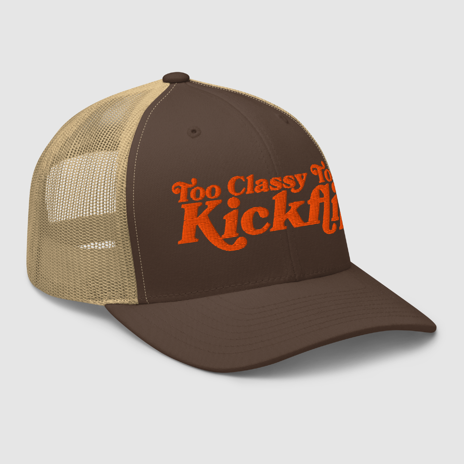 Angled view of retro-inspired trucker cap with Too Classy To Kickflip design