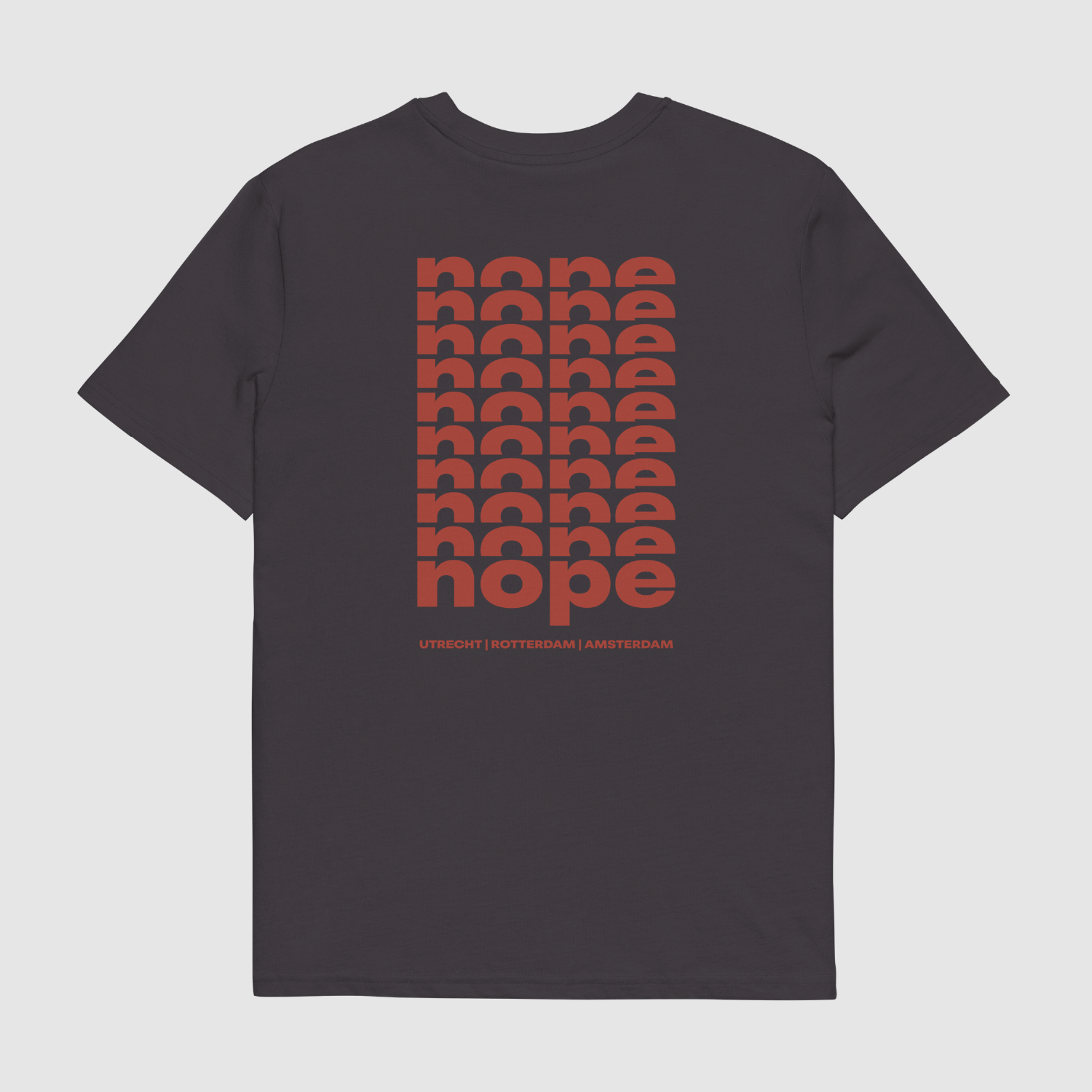 Back of anthracite Nope T-shirt featuring stacked bold red logo print and Dutch cities — streetwear by Mr. Nope