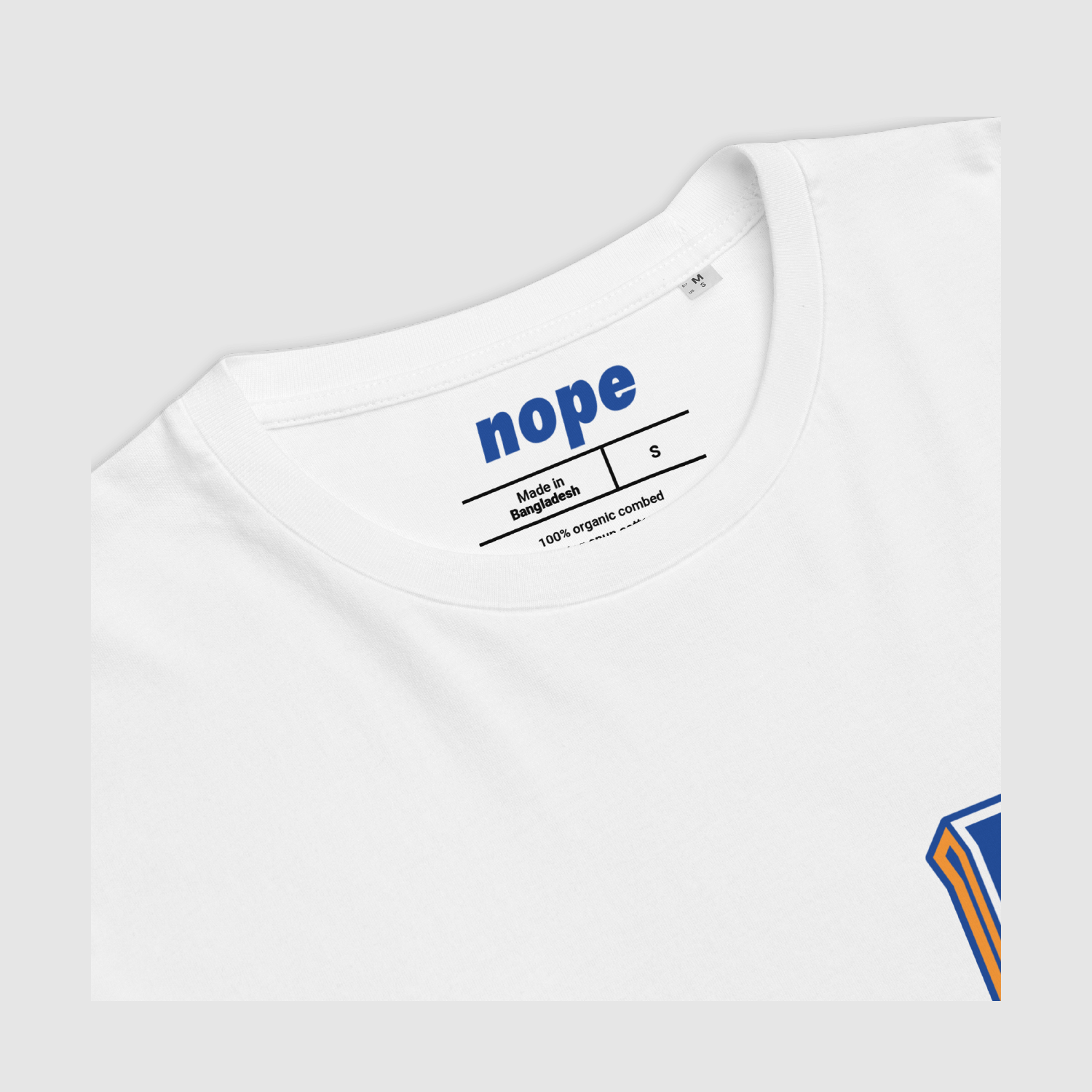 Collar and inner neck print detail of Nope 3D Logo Tee – 100% organic cotton