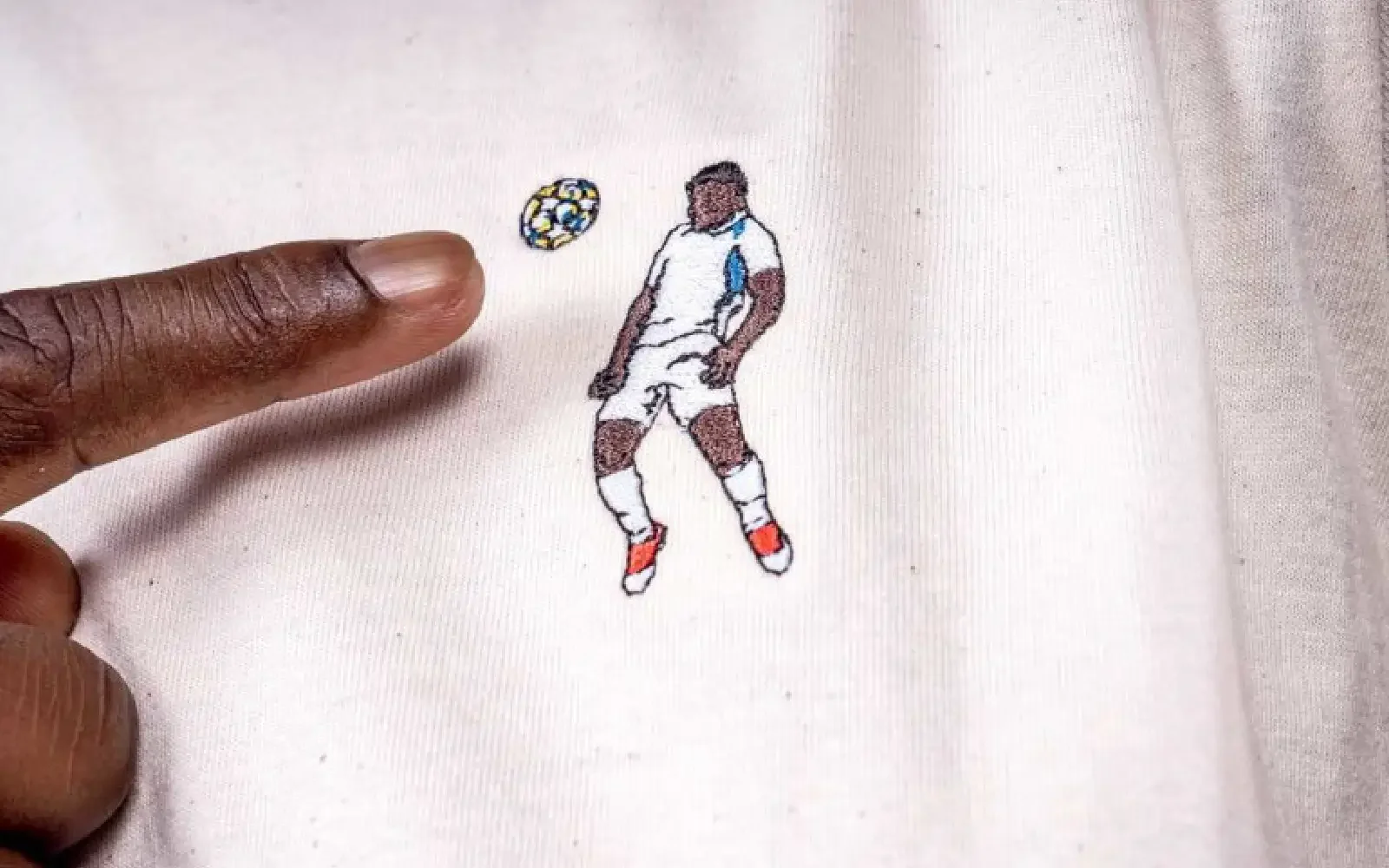 KRC Genk embroidered fan T-shirt design by Nope Design, celebrating iconic football moments.