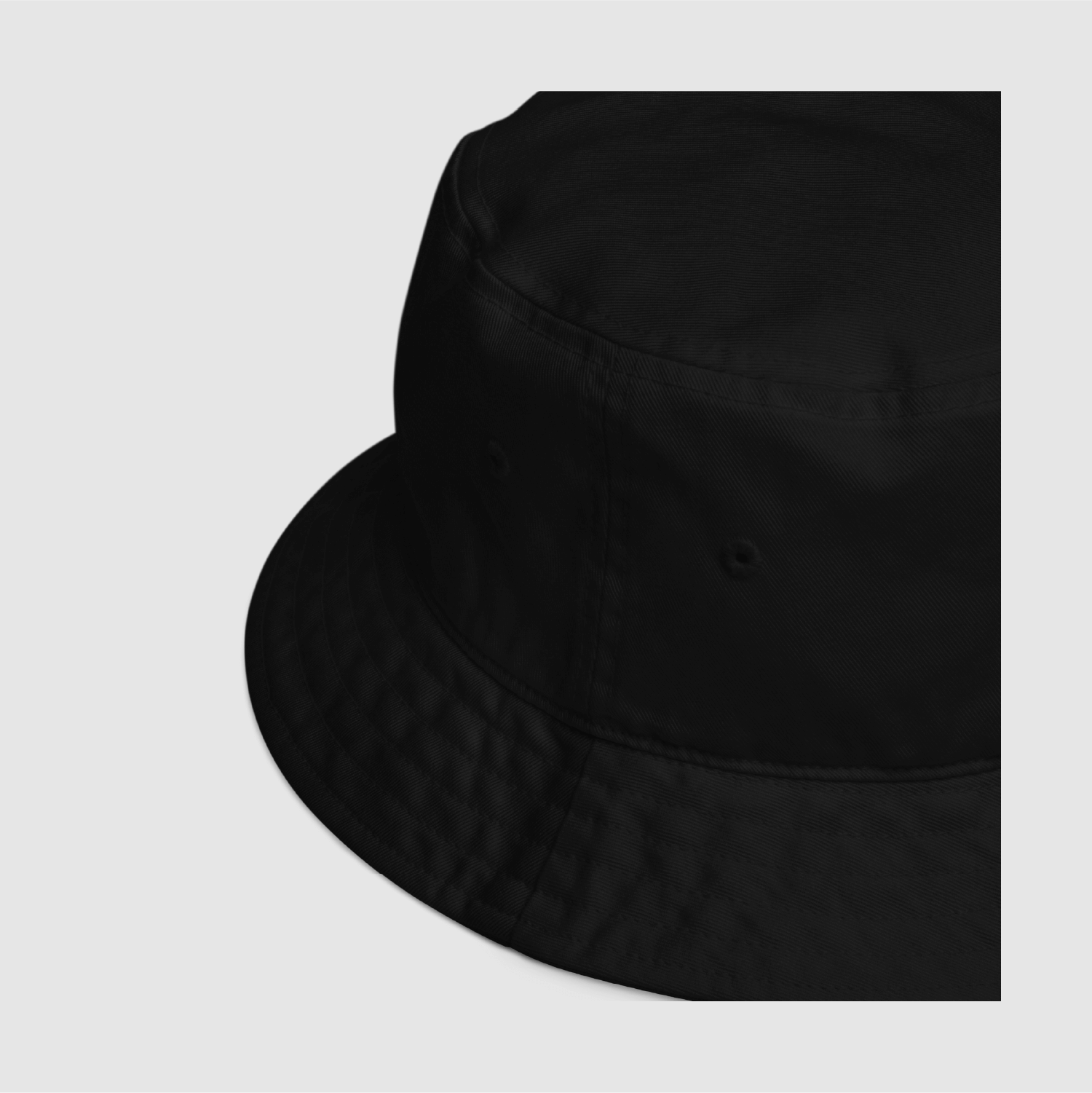 Side view showing breathable eyelets and brim detail on the Sit Exams™ hat
