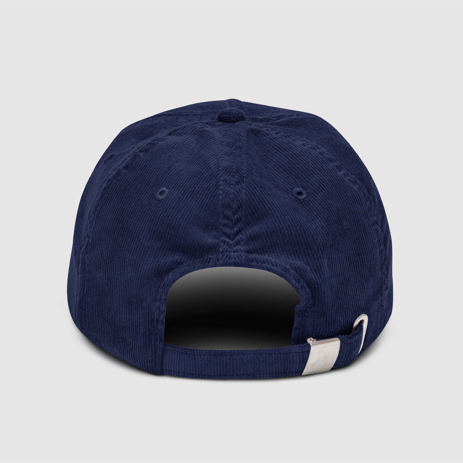Rear view of the cap with silver buckle and adjustable strap
