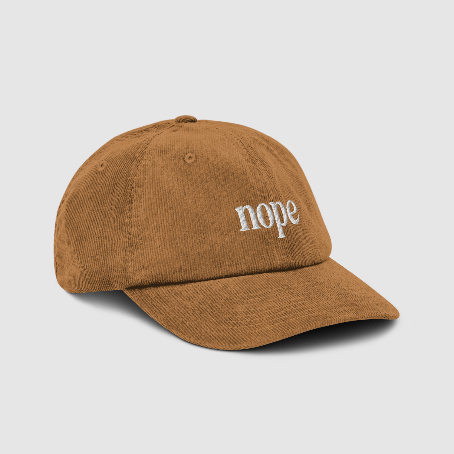 Side-back view of the cap showing the adjustable strap and unstructured shape