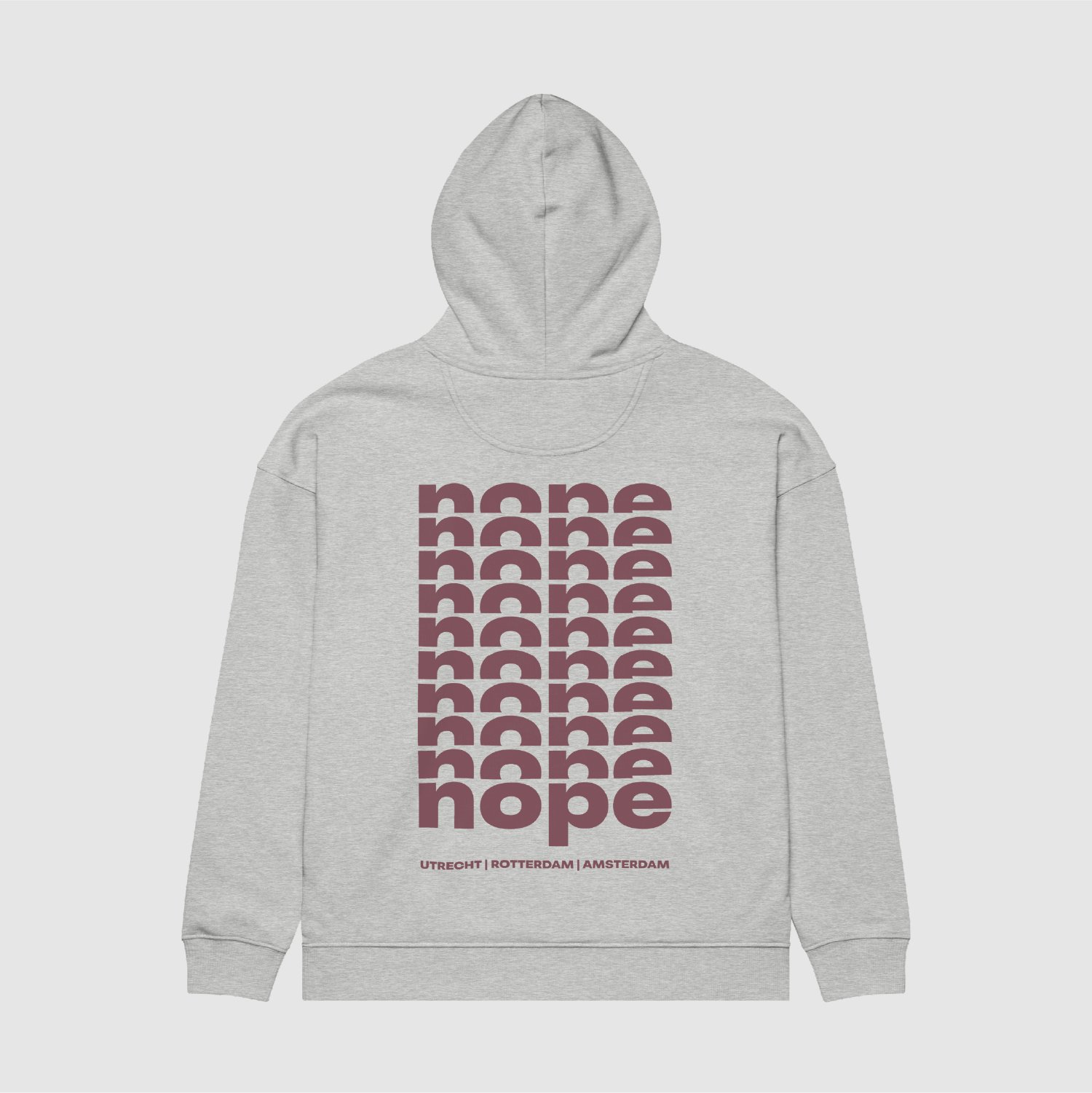 Back view of grey hoodie featuring stacked nope text graphic by Mr. Nope – NO ORDINARY SYSTEM collection