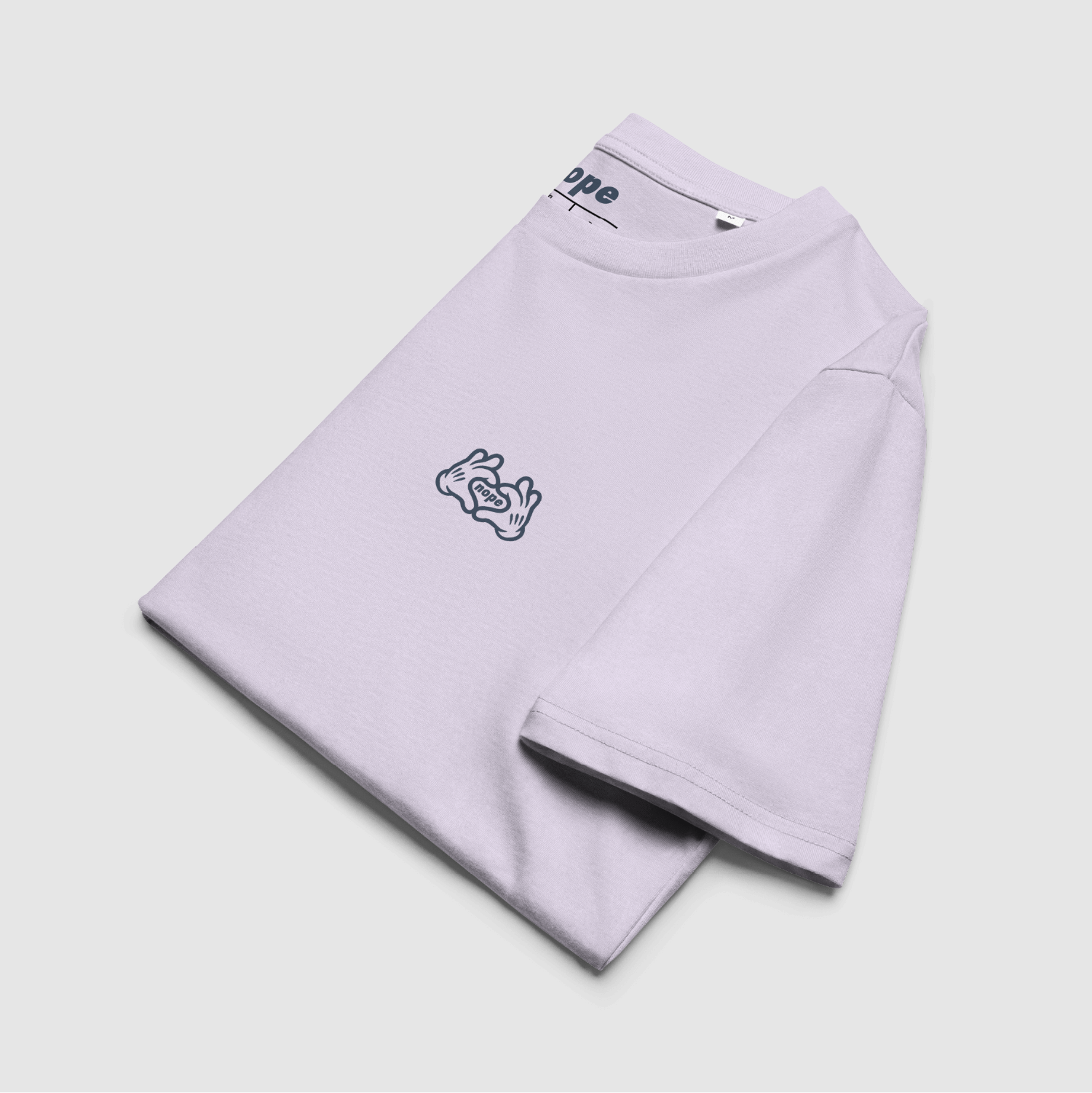 Folded Nope Love Hands Tee in lavender – chest logo visible