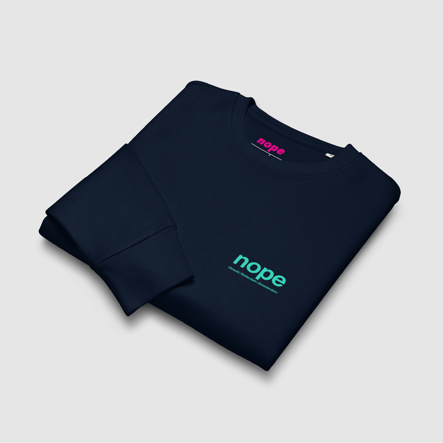 Flat Lay Folded View: Folded Nopehaus Zoned navy sweatshirt with minimalist front logo – designed by Mr. Nope