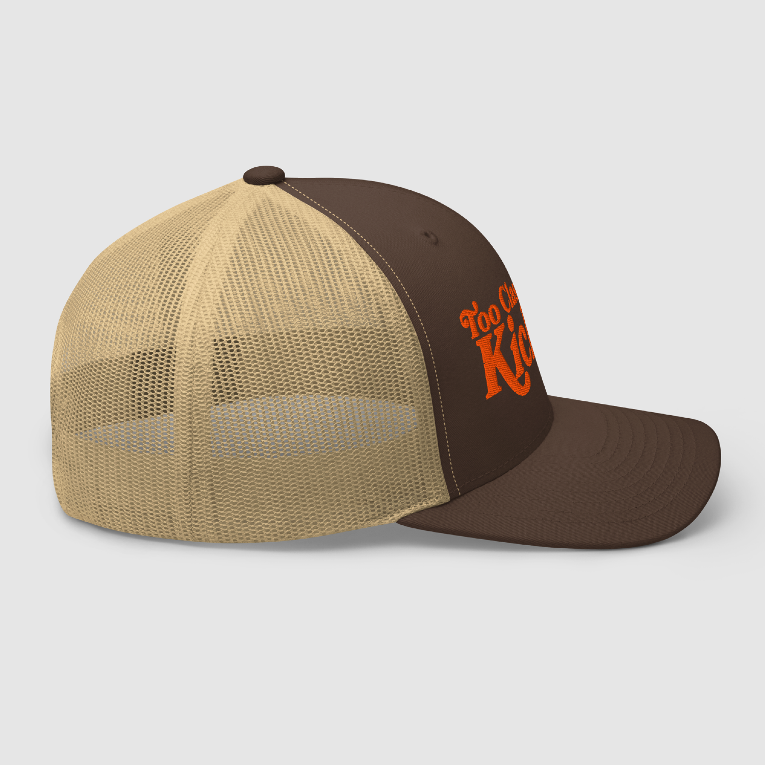 Side view showing structured brown front and khaki mesh