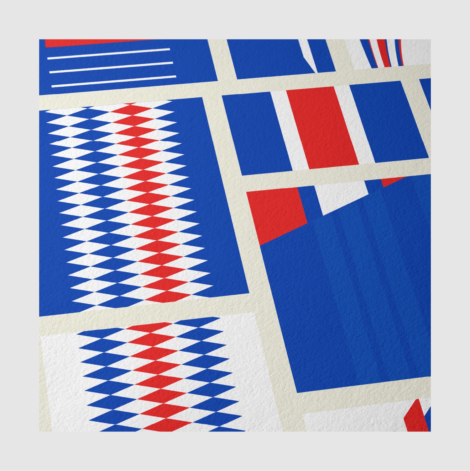 Close-up of red, white, and blue football graphic inspired by historic French shirt designs