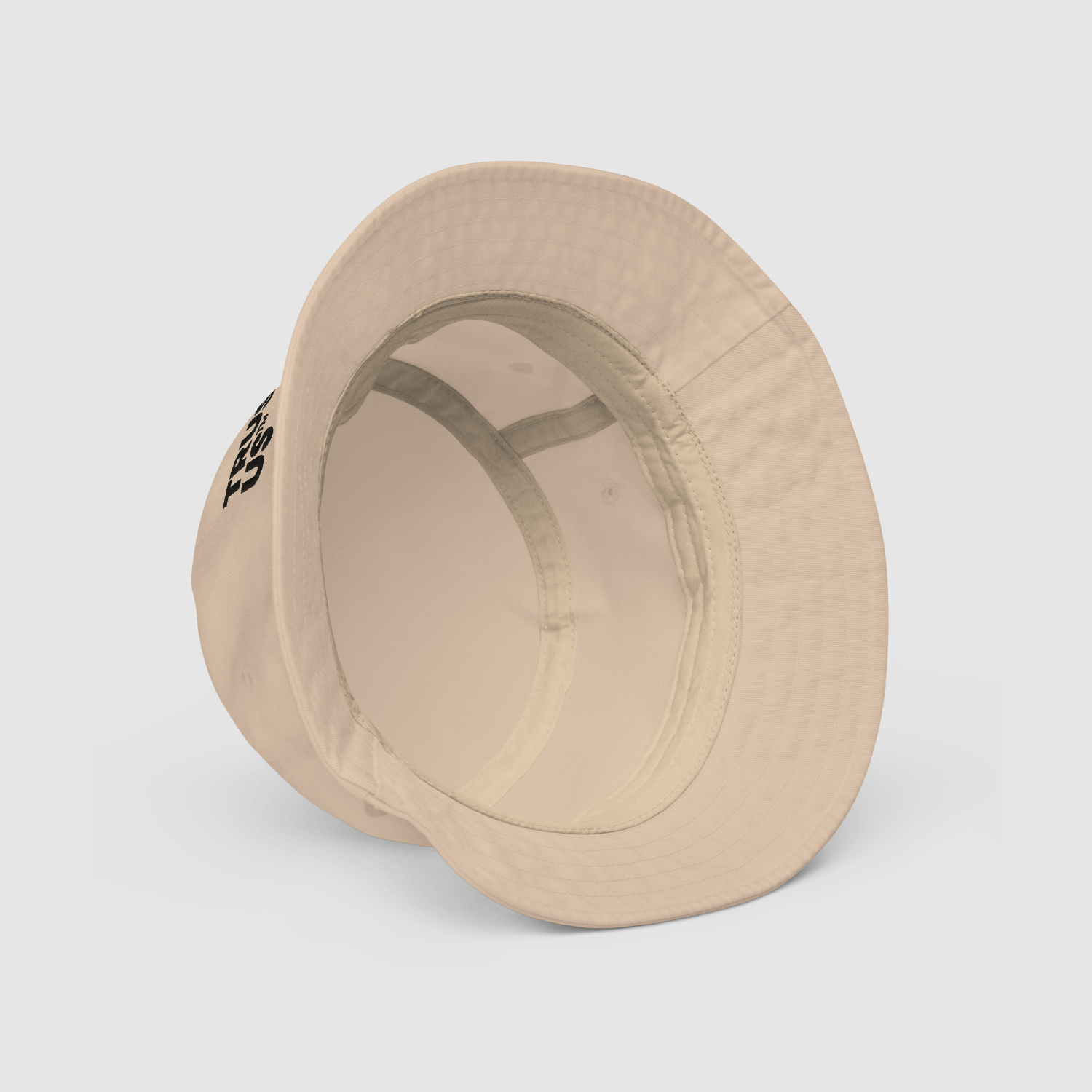 Inside stitching and construction of Trust Us™ Bucket Hat in organic cotton twill