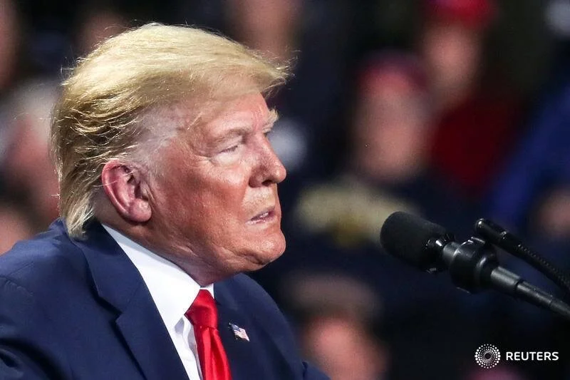  U.S. President Donald Trump reacts while speaking during a campaign rally in Battle Creek, Michigan, U.S., December 18, 2019. REUTERS/Leah Millis 