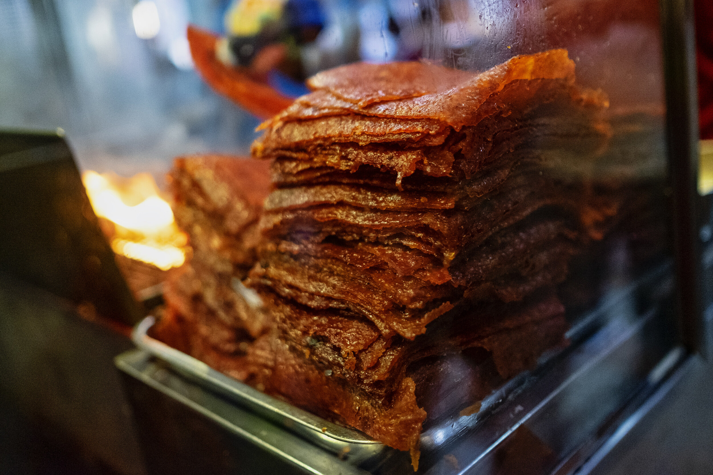  Stacks of marinated pork are seen before they hit the charcoal grill before they are sorted for packing in the final stage of Bak Kwa production 