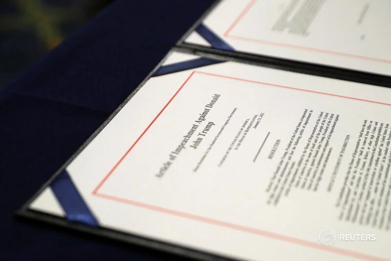  A close-up view of the article of impeachment against U.S. President Donald Trump, which U.S. House Speaker Nancy Pelosi (D-CA) will sign in an engrossment ceremony, at the U.S. Capitol in Washington January 13, 2021. REUTERS/Leah Millis -  