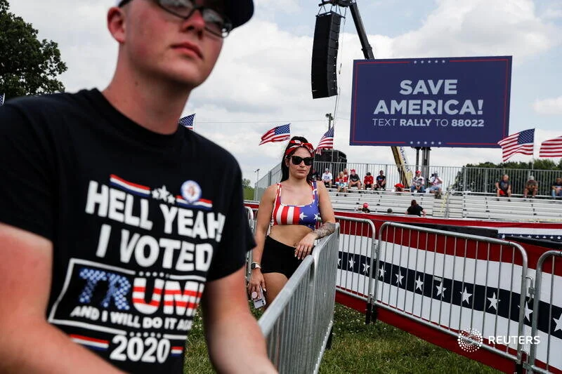  Supporters of former U.S. President Donald Trump gather for his first post-presidency campaign rally at the Lorain County Fairgrounds in Wellington, Ohio, U.S., June 26, 2021. REUTERS/Shannon Stapleton 