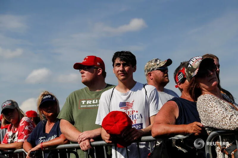  Supporters of former U.S. President Donald Trump gather for his first post-presidency campaign rally at the Lorain County Fairgrounds in Wellington, Ohio, U.S., June 26, 2021. REUTERS/Shannon Stapleton 