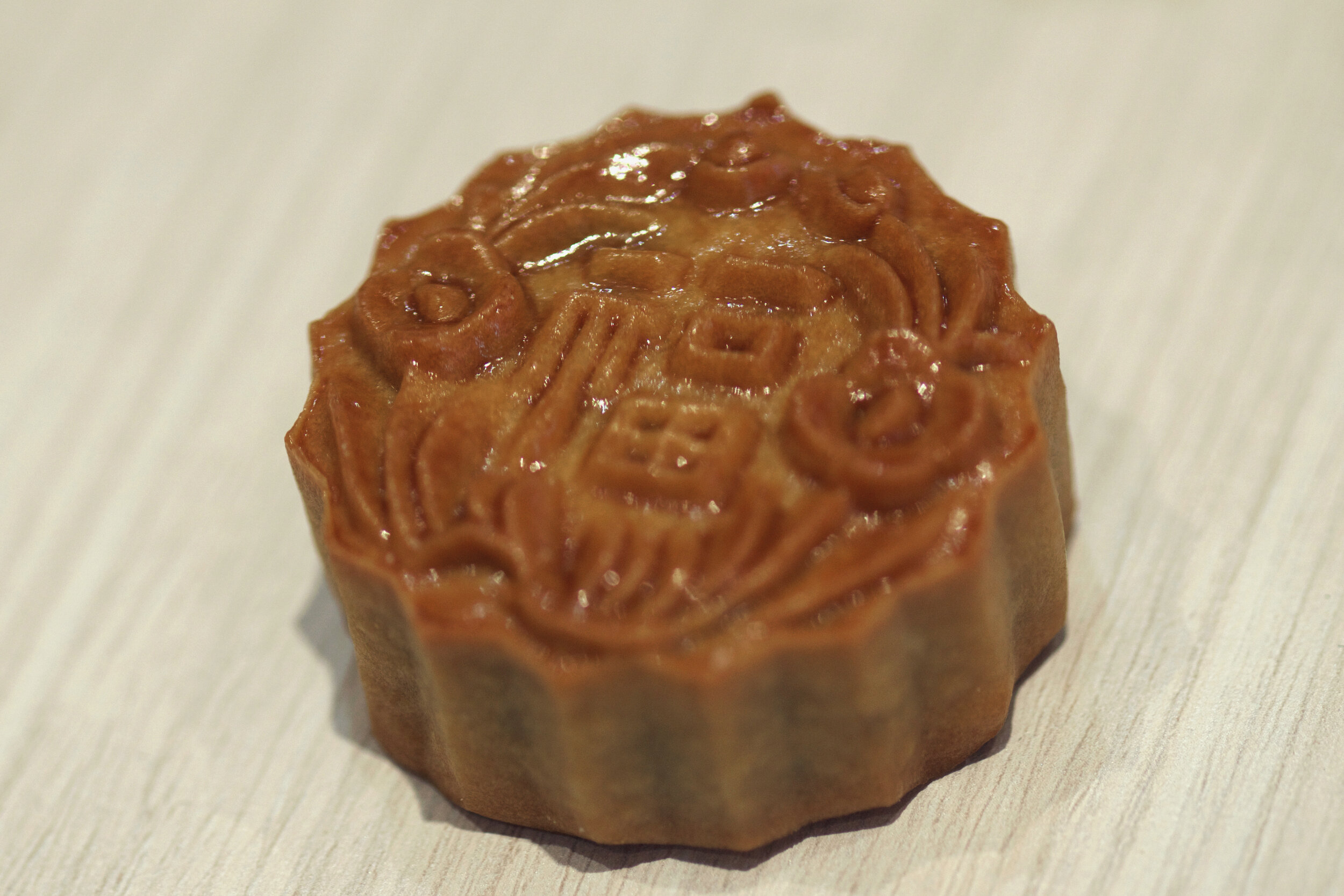  A mini mooncake is displayed for sale at traditional Cantonese confectionery Tong Heng in Singapore April 21, 2018. 