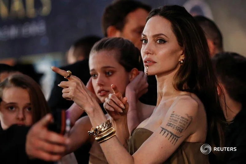  Cast member Angelina Jolie reacts at the premiere for the film "Eternals" in Los Angeles, California, U.S. October 18, 2021. REUTERS/Mario Anzuoni 