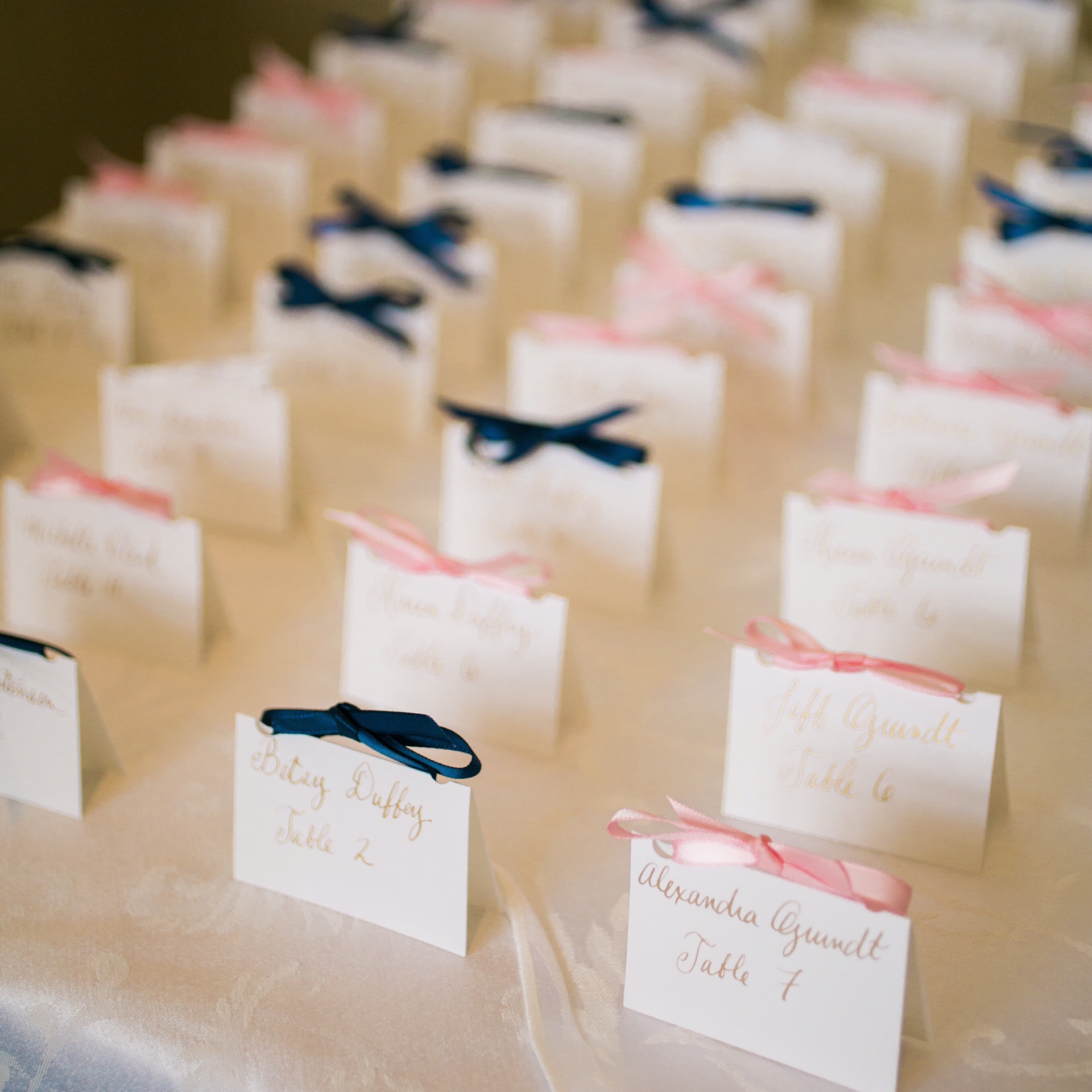  White place cards with gold calligraphy :: Opaline Lettering 