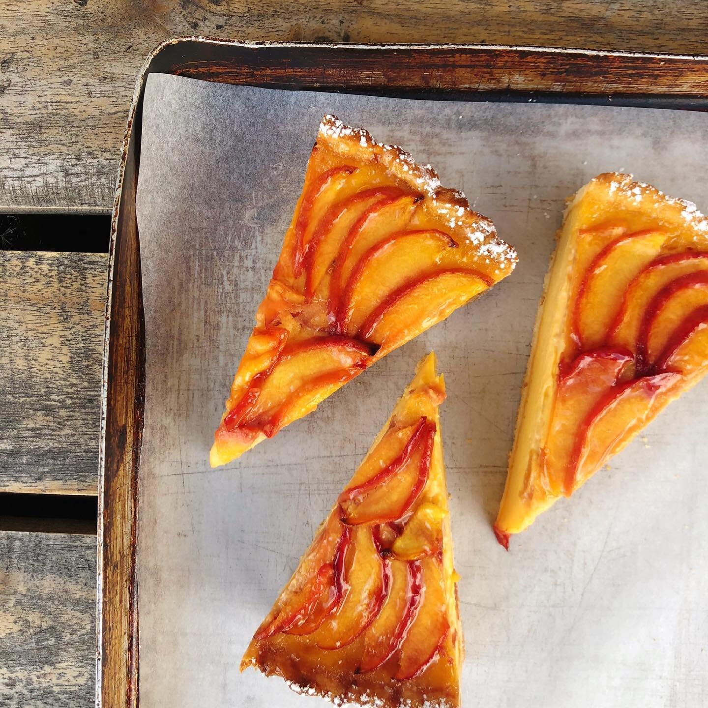 We&rsquo;ll have this lovely peach &amp; basil custard tart over the weekend &mdash; the perfect way to enjoy stone fruit season!