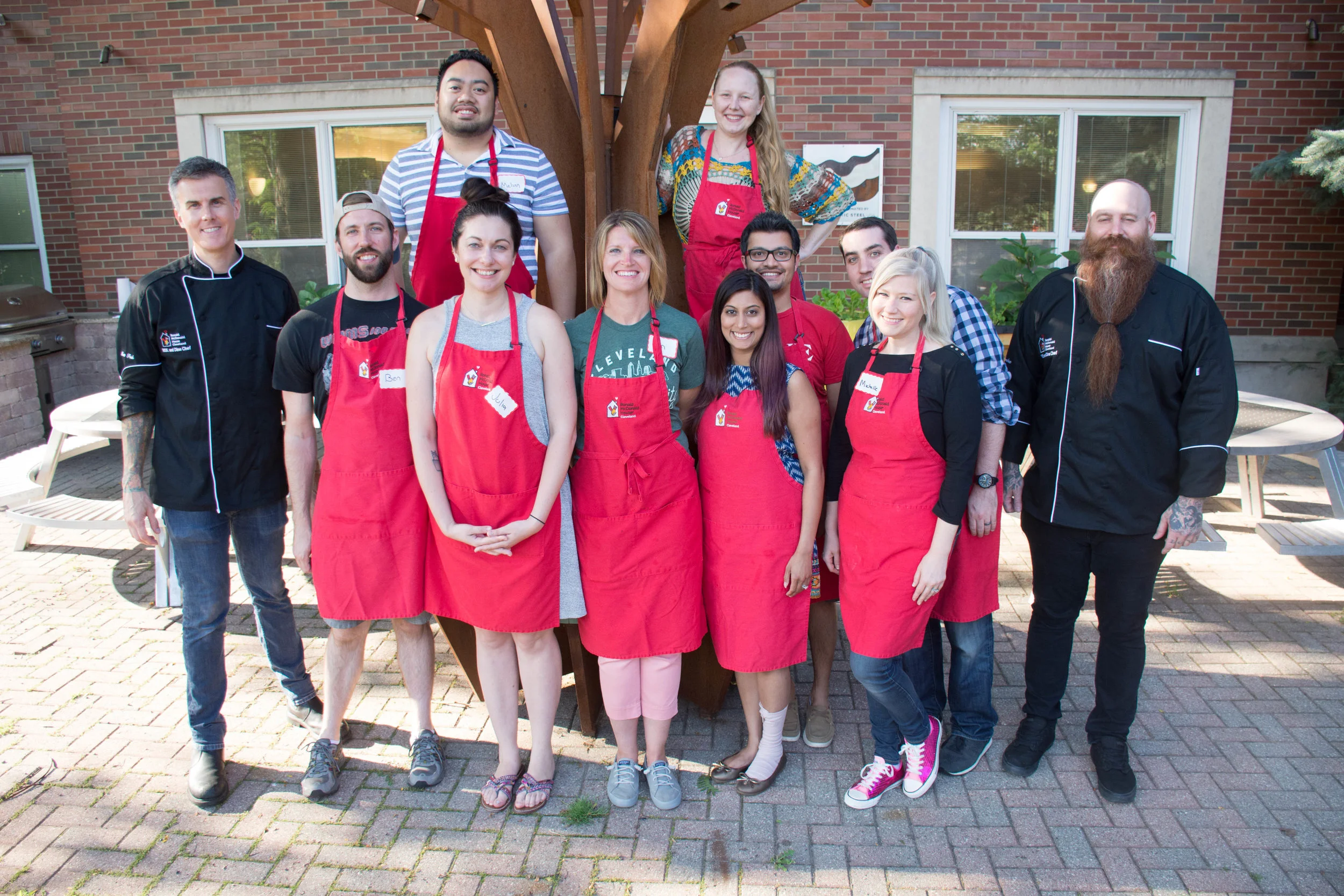 From left to right: Matt Fish (Founder, Melt ), Melvin Reyes (top, @cravetheland ), Tricia Chaves (top, @ptaomdotcom ), Ben and Julie Kowalczyk ( @beardandbroad ), Jen Rome ( @whycle ), Heena and Kushal Mistry ( @KushFood ), Michelle ( @clevelandfoodiegirl ) and John Koehn, Neil Sanchez (Director of Operations, Melt)