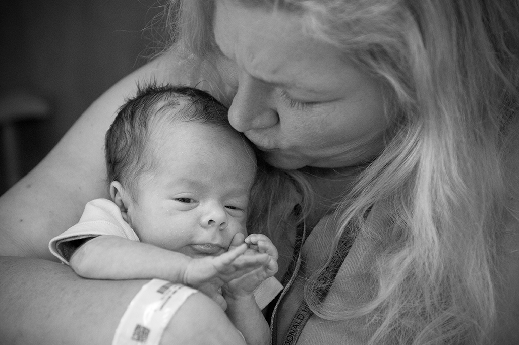 Grandma Kriss Coventry holds Christopher.