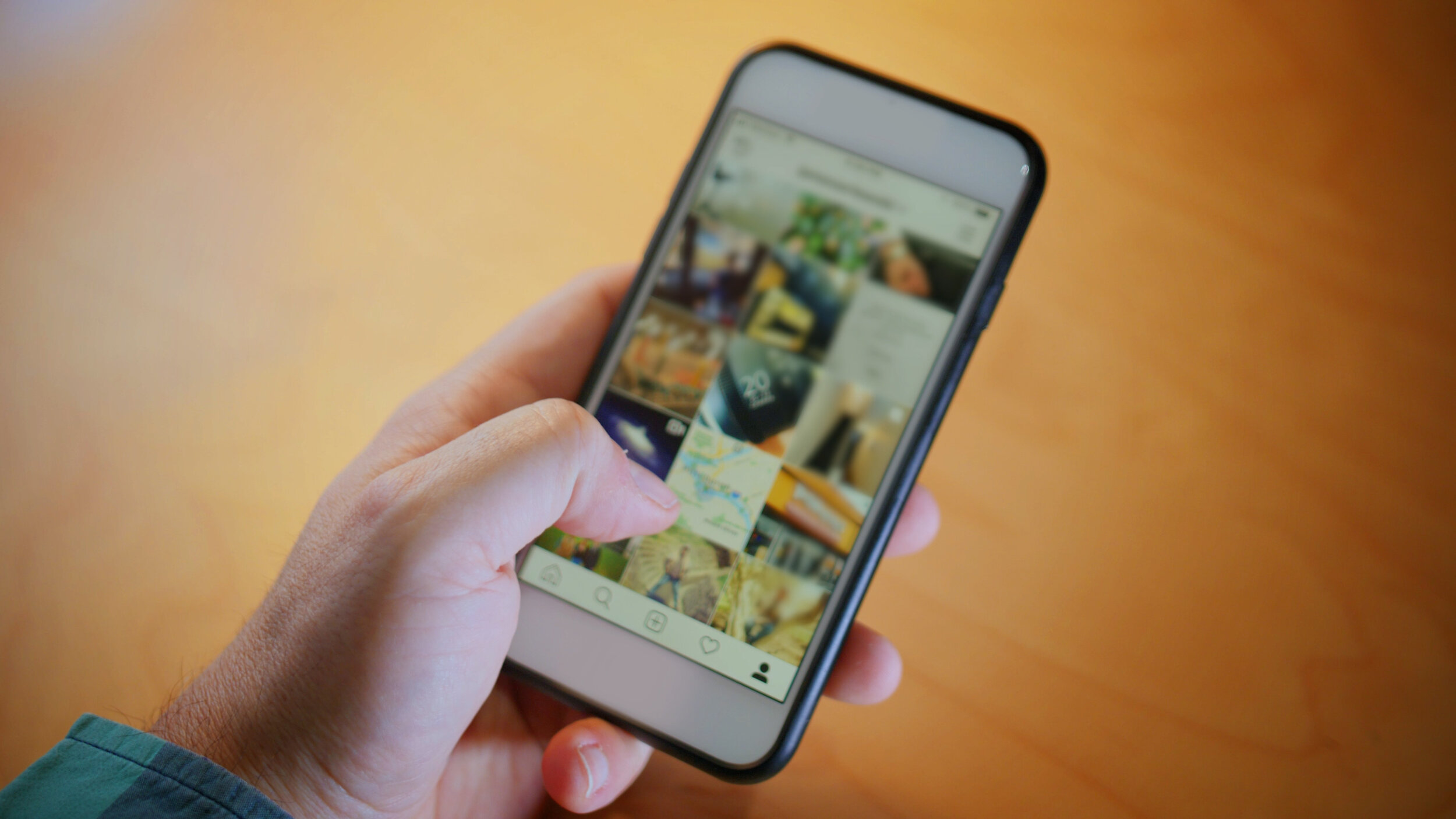 videoblocks-sb0085-a-closeup-with-shallow-dof-shot-of-someone-scrolling-through-social-media-posts-on-a-smartphones-touchscreen_BeR20bxK4.00_00_03_04.Still001.jpg