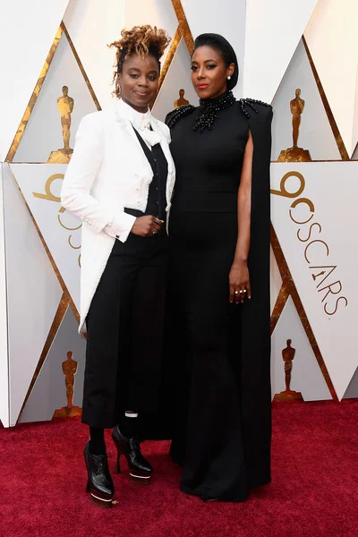 Dee rees (left), nominated for best adpated screenplay for "Mudbound." Her partner (right), Sarah Broom