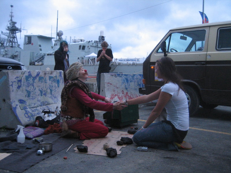 Wiener Shaman reads a fortune outside of Eastern Edge Gallery. 