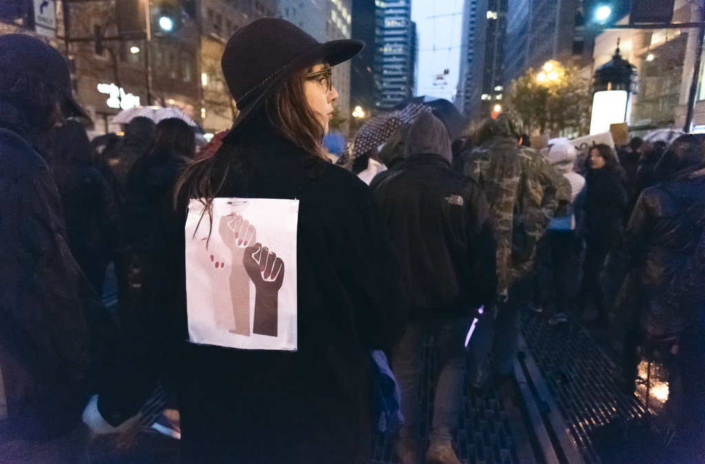 As the rain pours in San Francisco, a woman marches with thousands of others during the Women’s March on January 21, 2017. For many, the Women’s March helped people feel less alone and more unified after the aftermath of the presidential election. This march, and others, have inspired women to become more politically involved, whether it involves contacting members of Congress or running for political office. 