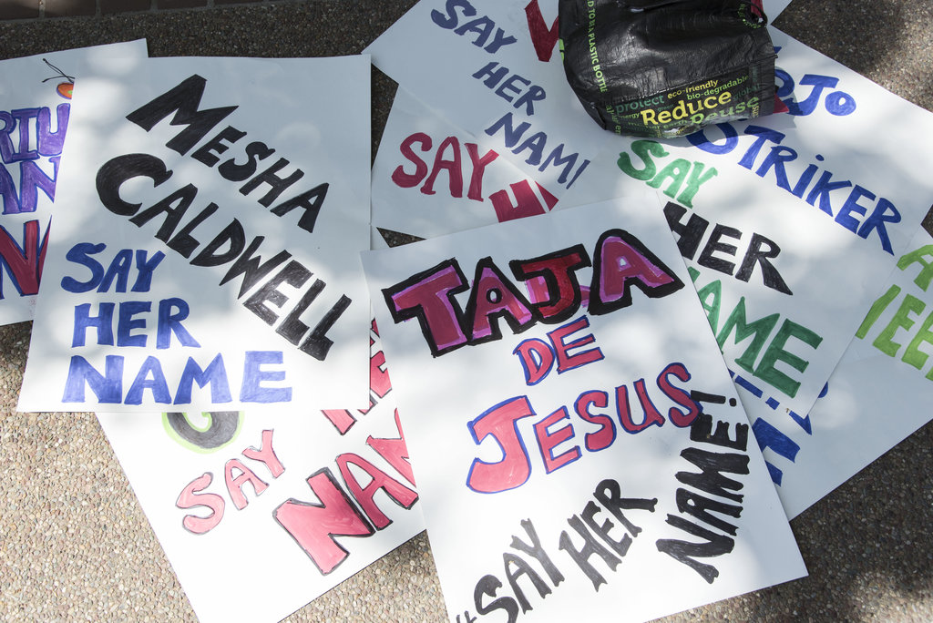 Signs lay stacked on the ground at a Human Billboard event outside Rockridge Bart station in Oakland, CA on April 1, 2017. Protestors stood to honor the lives of eight African-American and POC trans women who were murdered in the U.S. in the first 3 months of 2017. Their names are: Jaquarrius Holland, Chyna Gibson, Taja de Jesus, Ciara McElveen, Mesha Caldwell, Jamie Lee Wounded Arrow, Keke Collier, Jojo Striker and Alphonza Watson.
