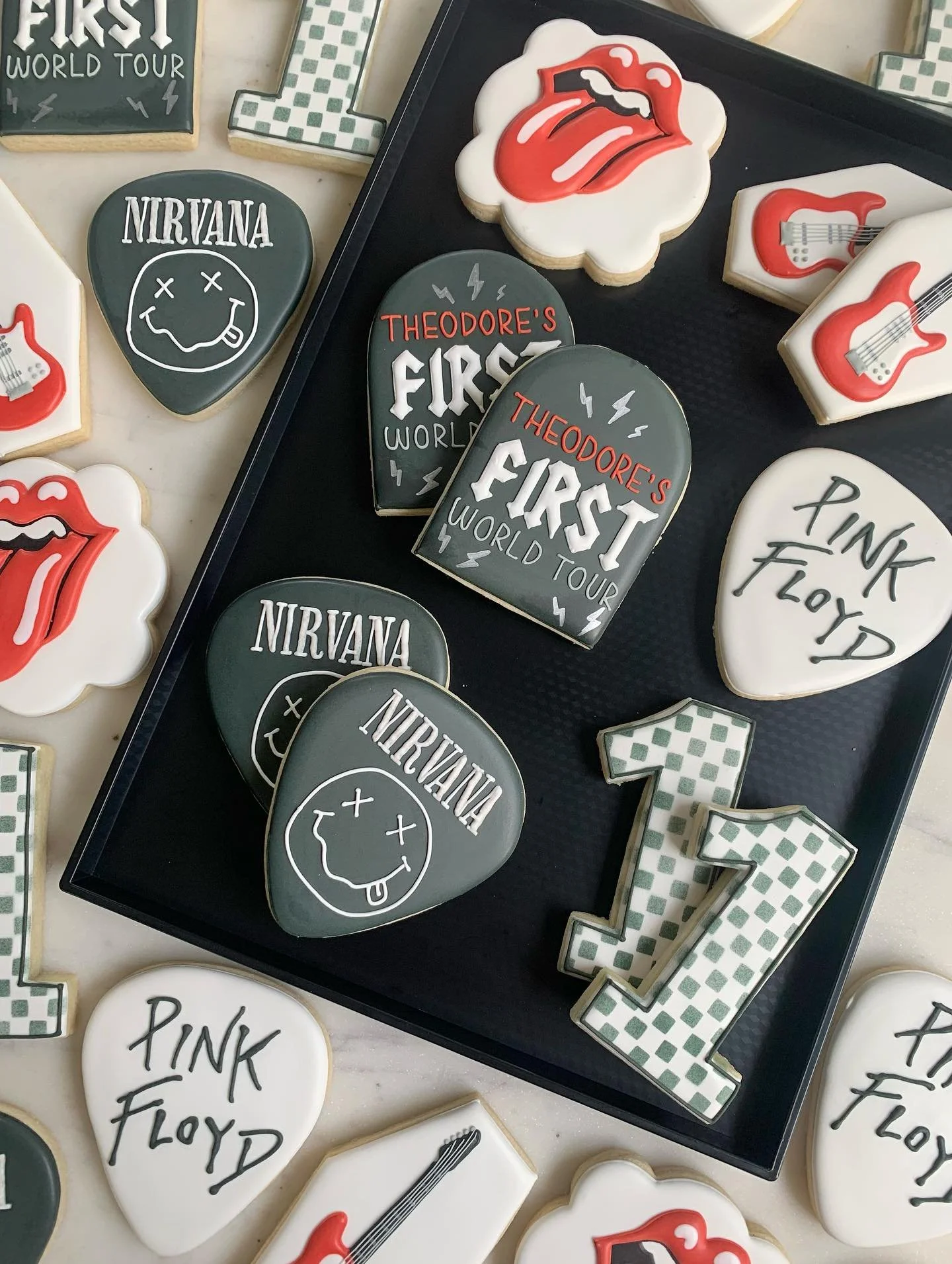 Rocking out for this first birthday theme! 🤘🏼
.
.
.
#cookies #decoratedcookies #sugarcookies #cookiedecorating #firstbirthdaycookies #firstworldtour #fairfieldct #fairfieldcounty #fairfieldcookies