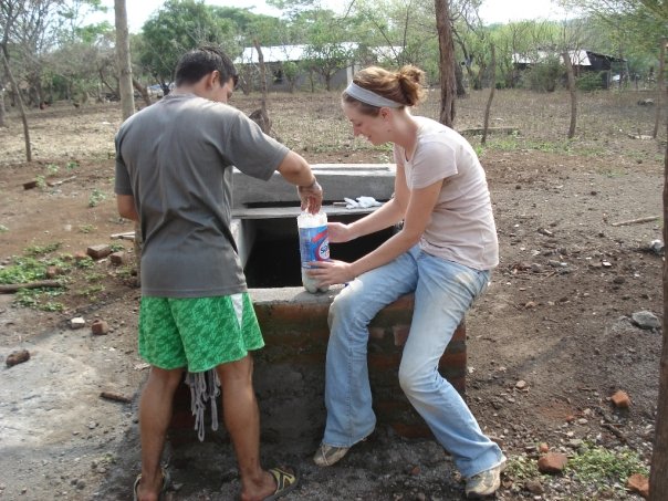 Audrey receiving a lesson in organic farming as a volunteer with Cristosal in Usulutan.