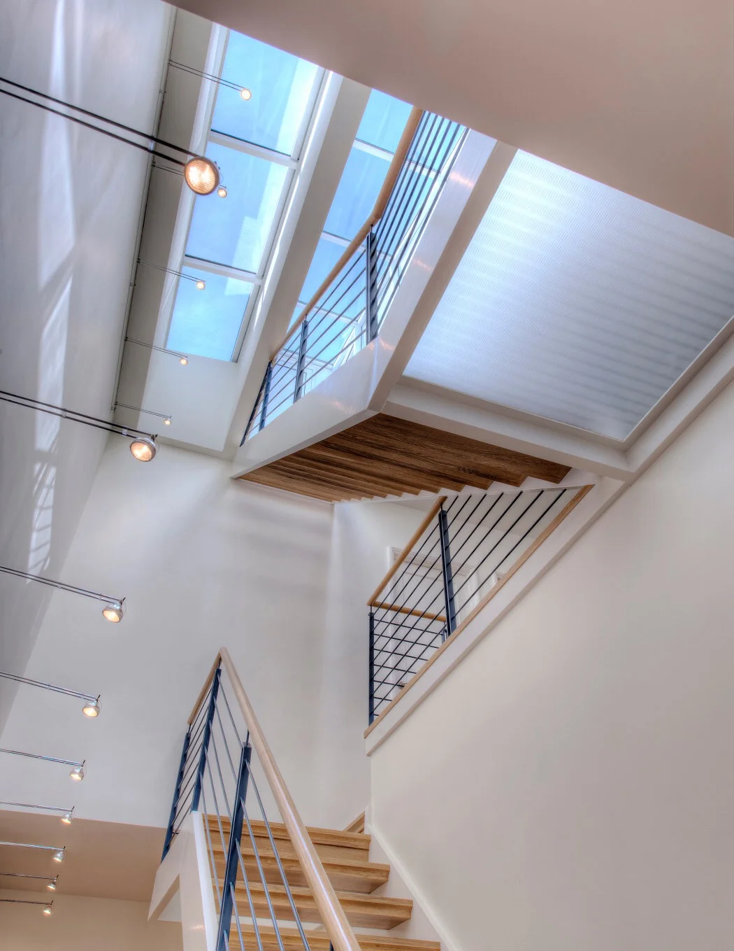 Dark Stairwell transformation breathes new life into home renovation