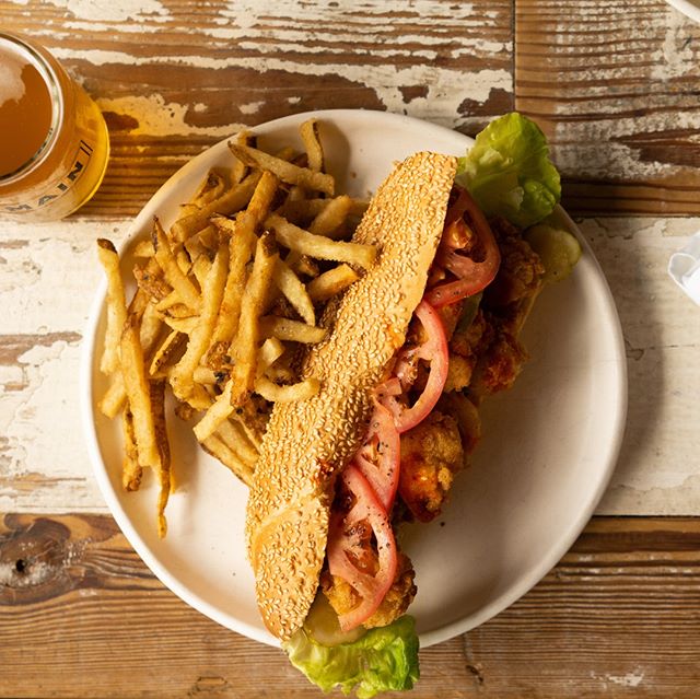 Not your average #poboy.  We prefer it overstuffed! | OVERSTUFFED SHRIMP PO&rsquo;BOY: fried gulf shrimp, bibb lettuce, tomato, comeback sauce, louisiana hot sauce #southmainkitchen