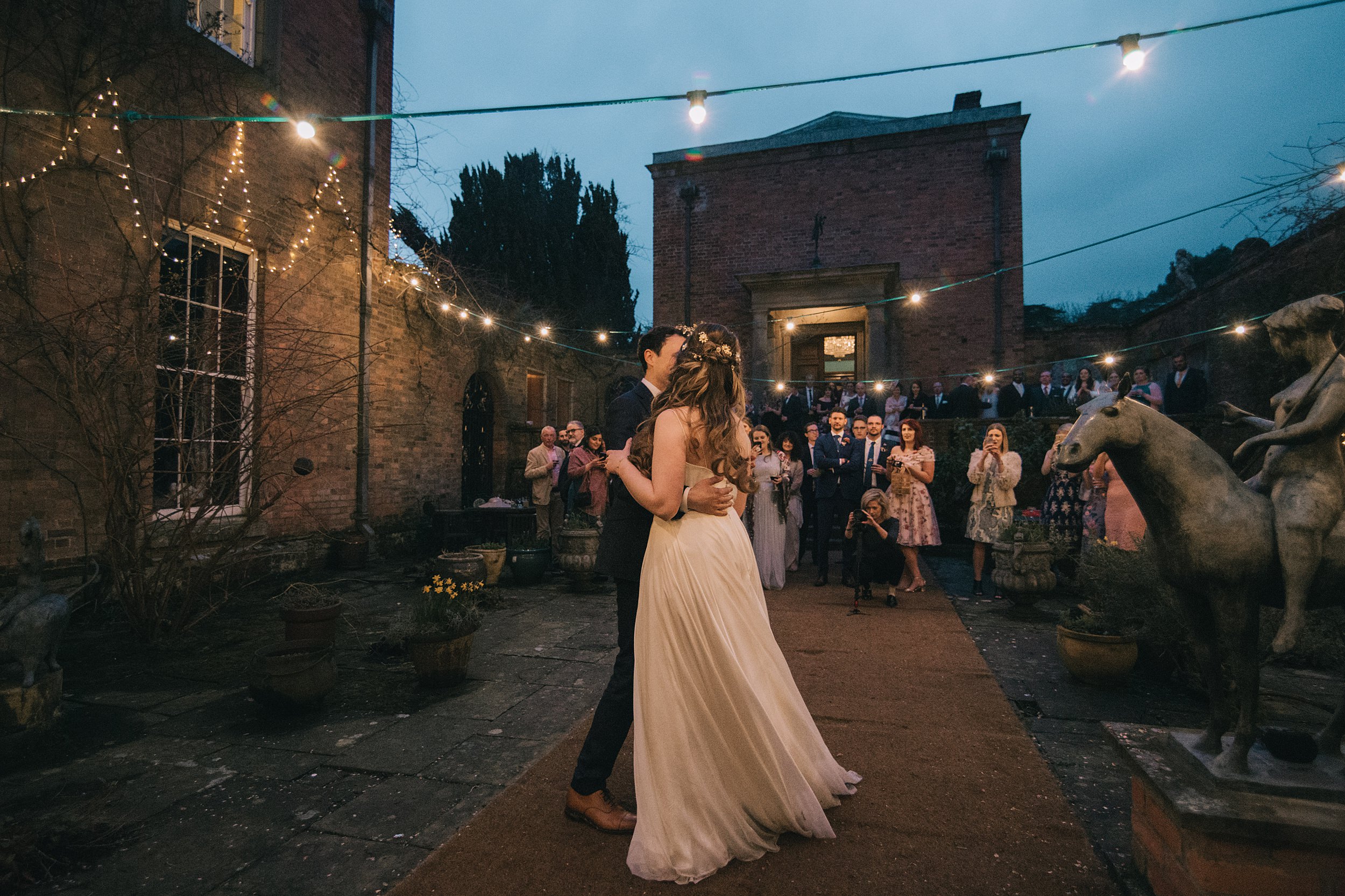 Festoon lighting first dance wedding photography