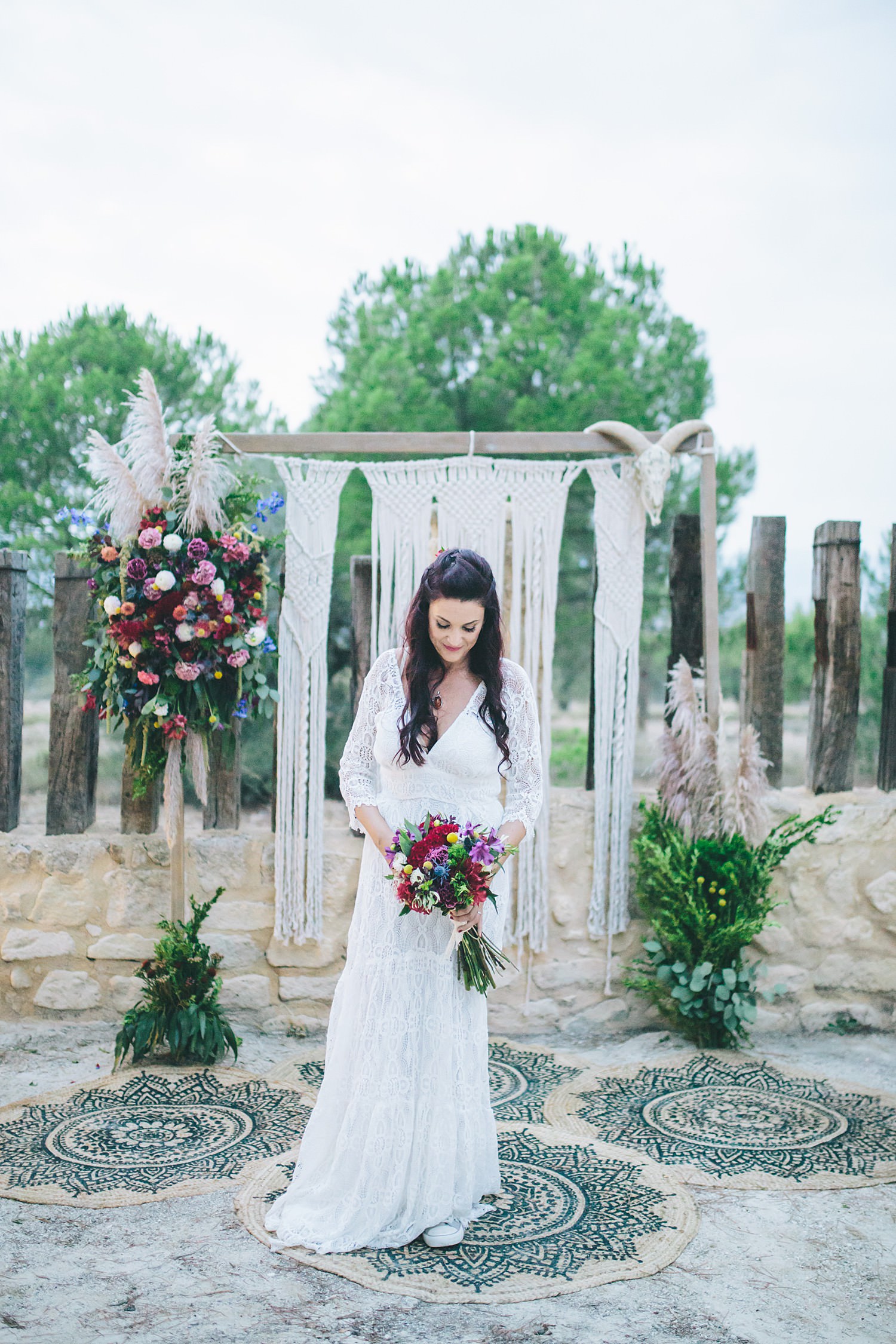 Boho bride macrame wedding backdrop destination wedding photographer