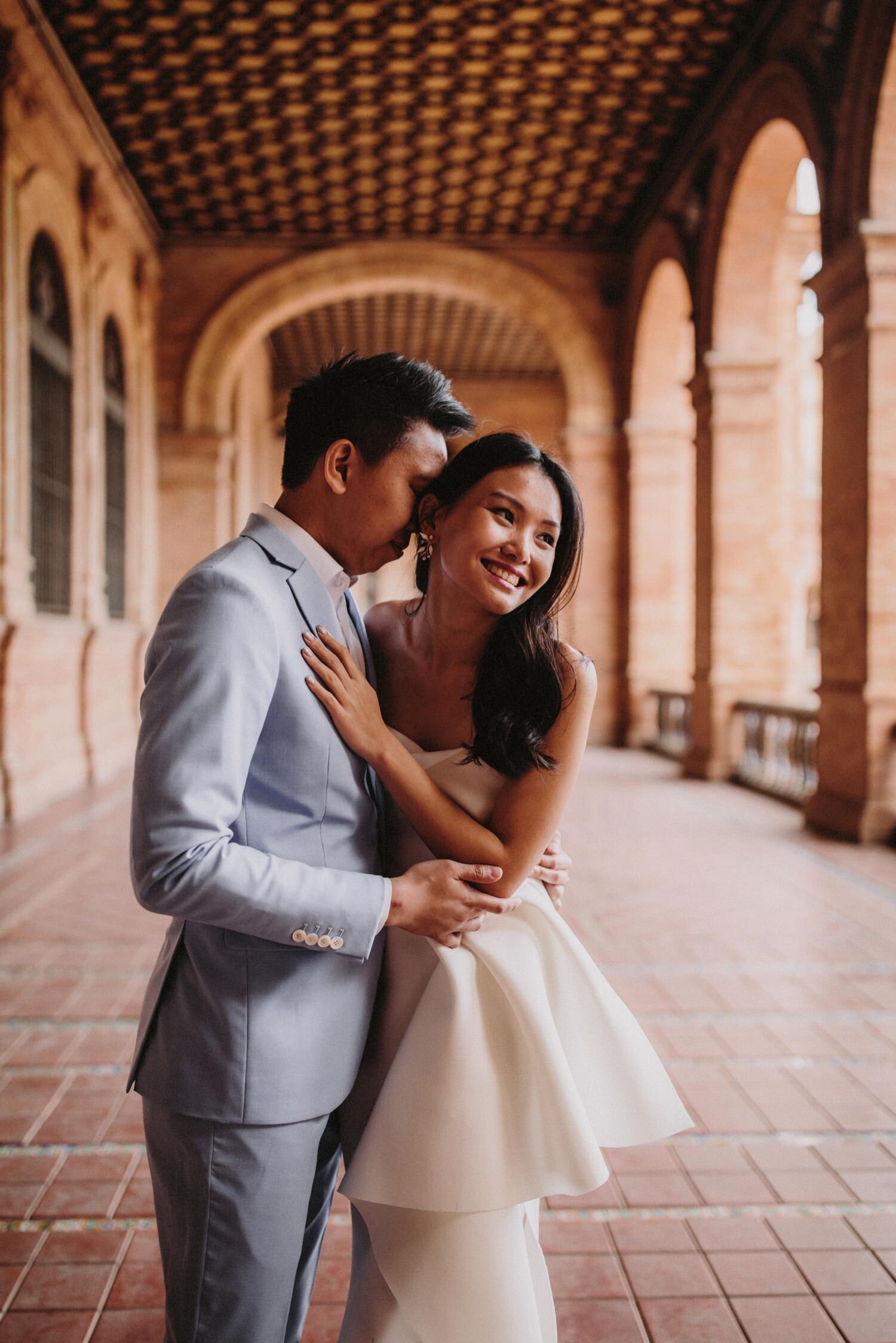 23_plazadeespañaelopement_weddingphototographer_asianelopement_asianweddingseville_sevillaelopement_sevillewedding_elopementinseville_ernestovillalba.jpg