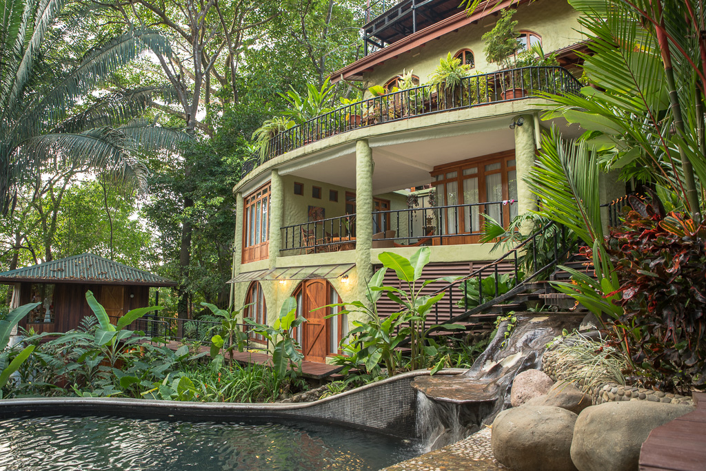 Casa de las Brisas in Costa Rica. The home for the Barkarica experience. This is the view from the largest of 3 pools towards the back of the house. 