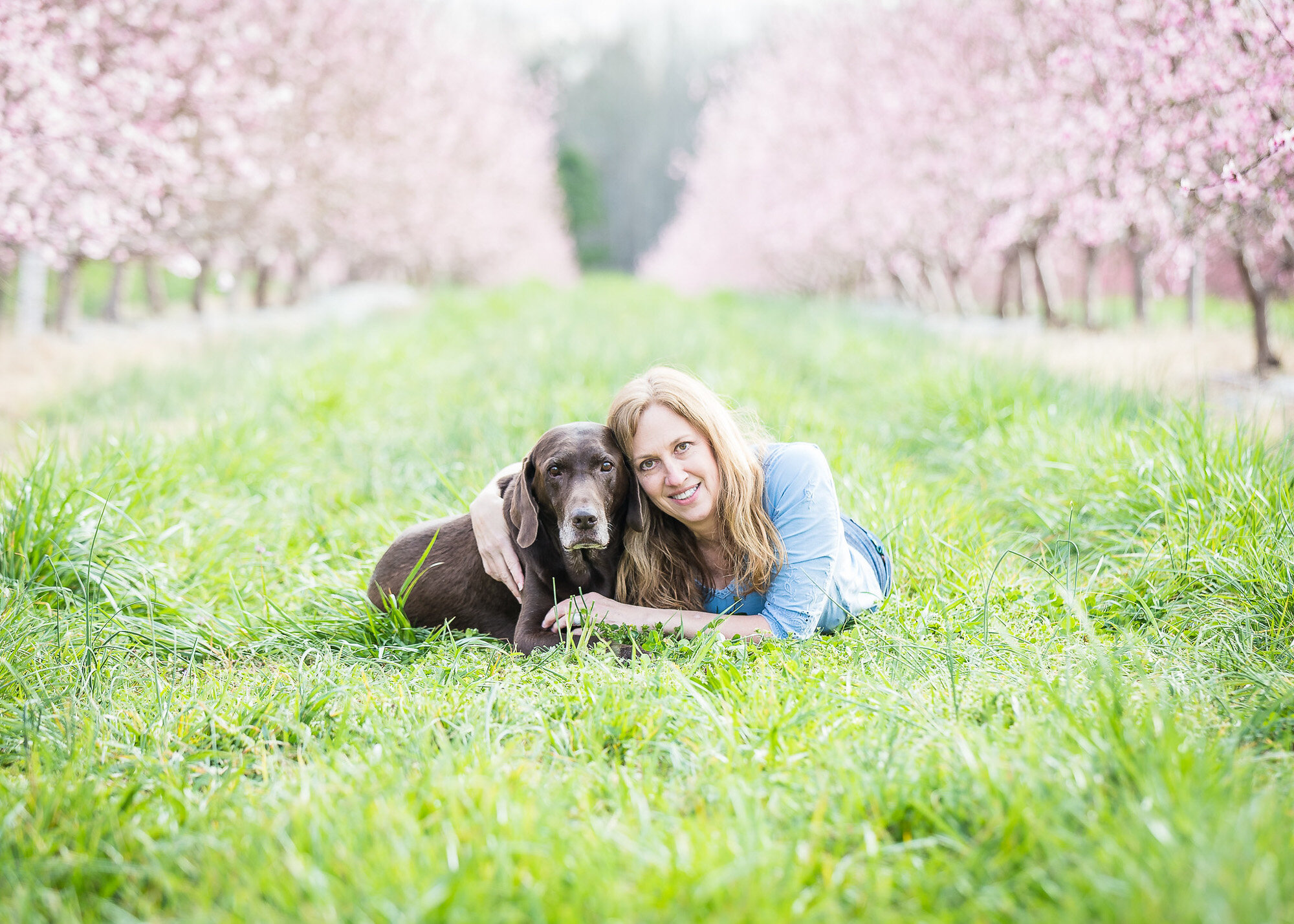 family portrait in peach blossoms