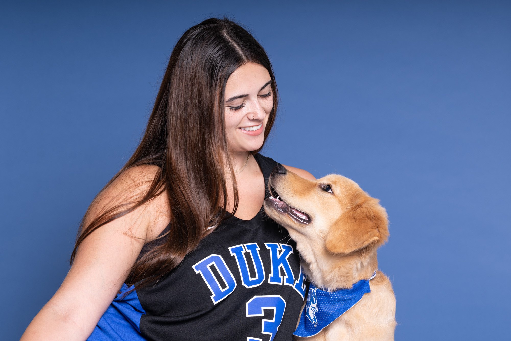 Duke basketball dog mom and dog.jpg