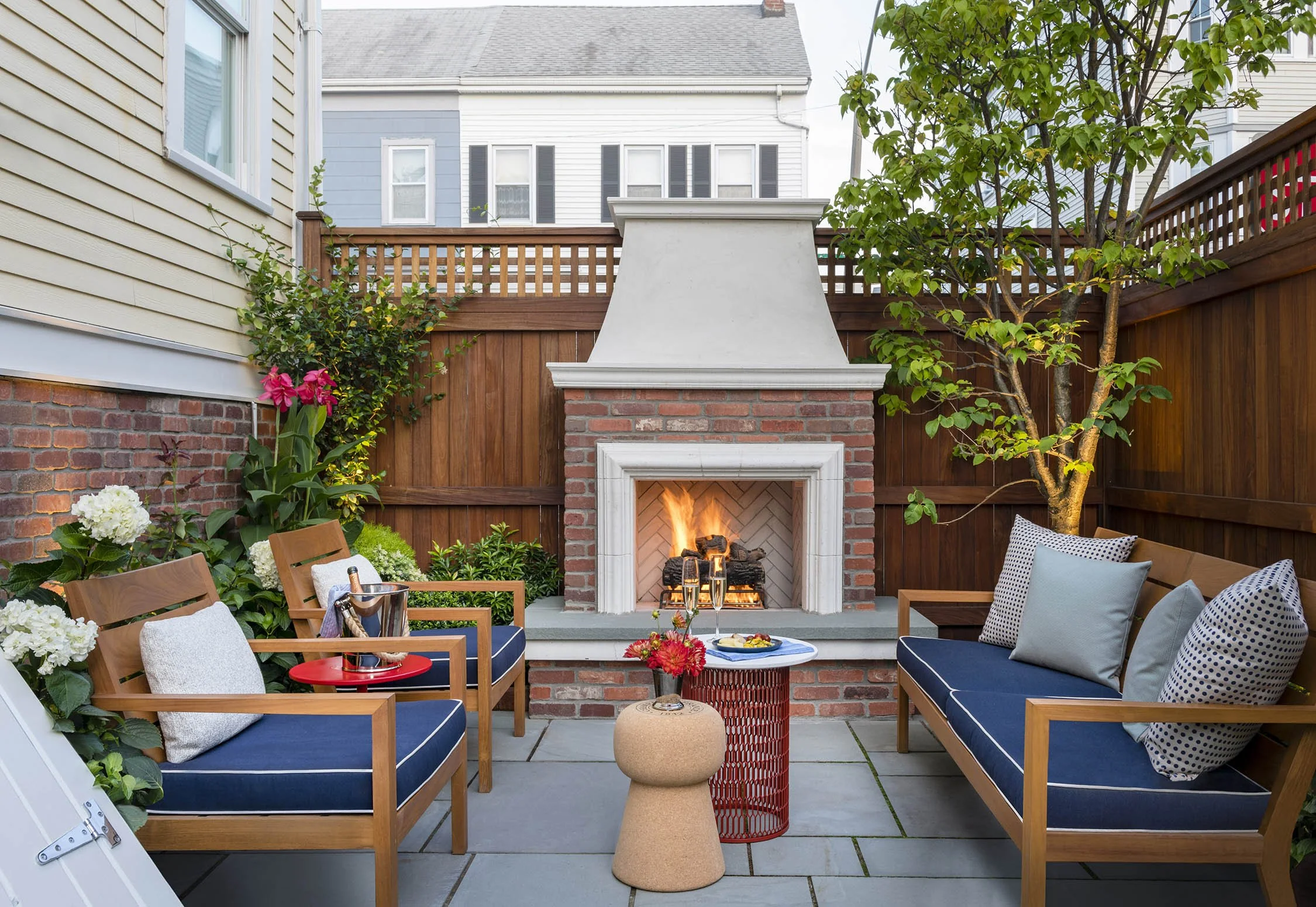 Urban_outdoor_living_design_modern_brick_fireplace_lounge_trevor_fulmer.jpg