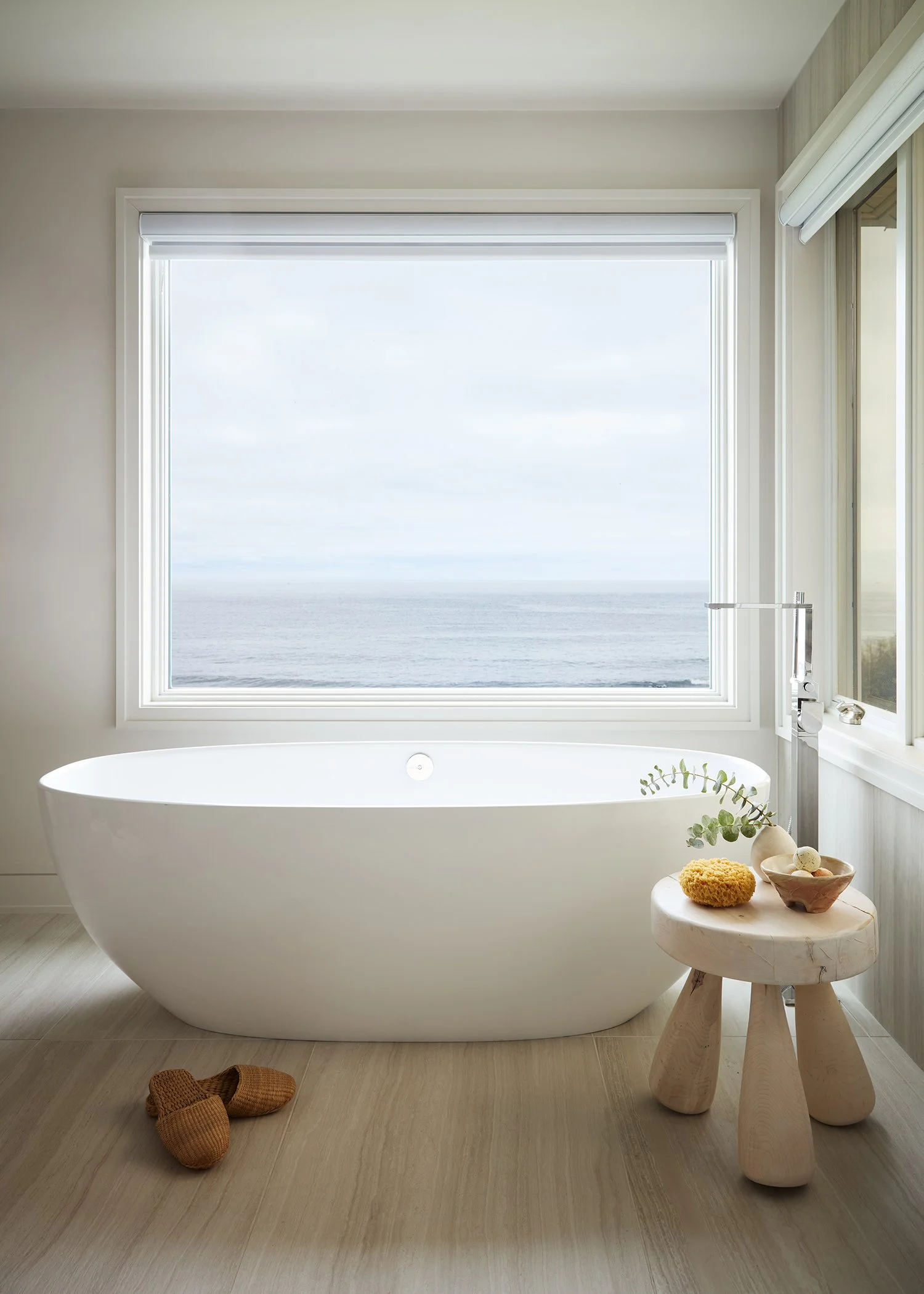 trevor_fulmer_design_seaside_nautical_interior_design_modern_bathroom_remodel_freestanding_tub_window_ocean_view_boston_rhode_island_coastal_home_award_winning_interior_design_1.jpg