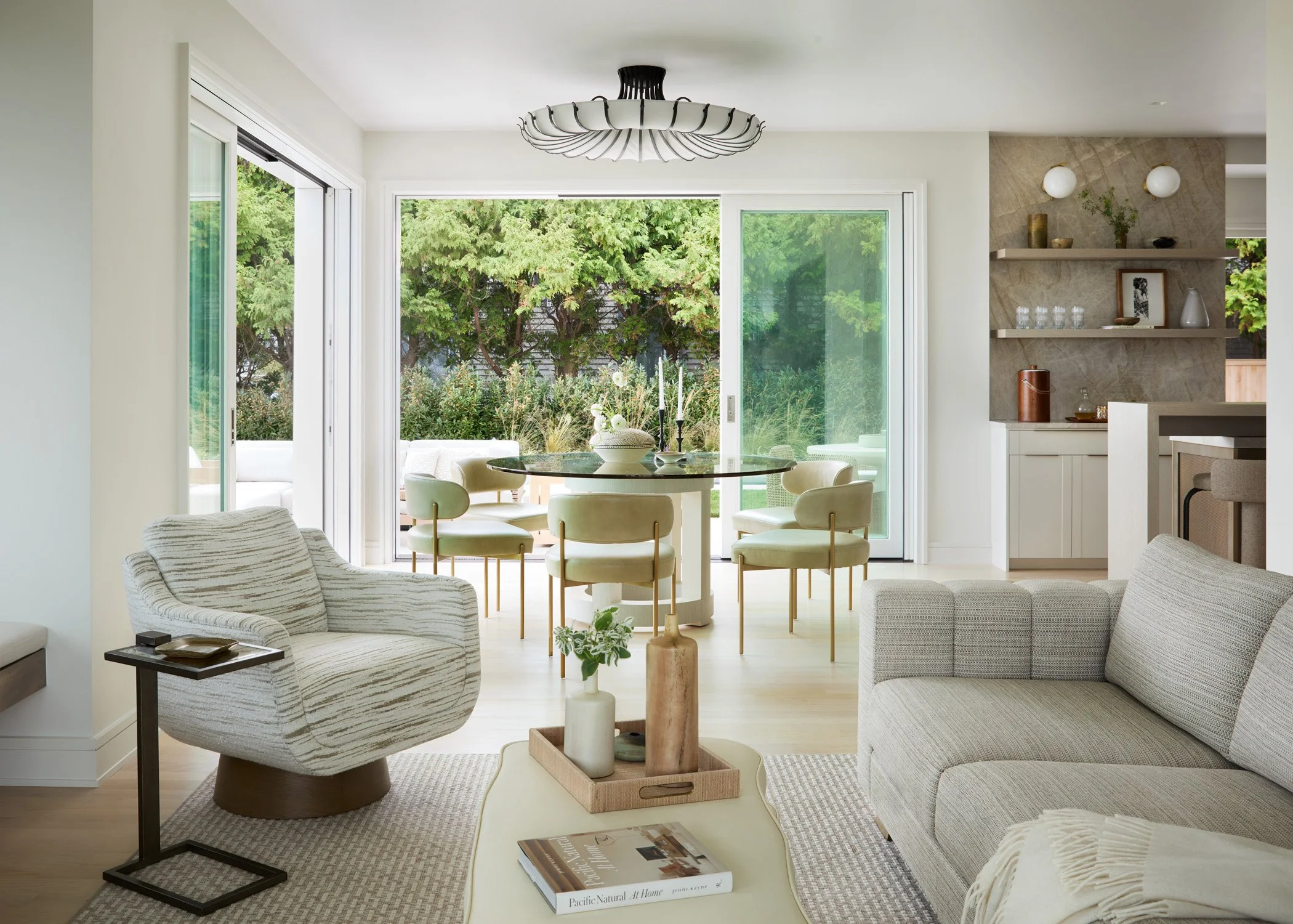 trevor_fulmer_design_seaside_nautical_interior_design_modern_luxury_living_room_tufted_sofa_ocean_view_open_concept_dining_room_kitchen_boston_rhode_island_coastal_home_award_winning_interior_design.jpg