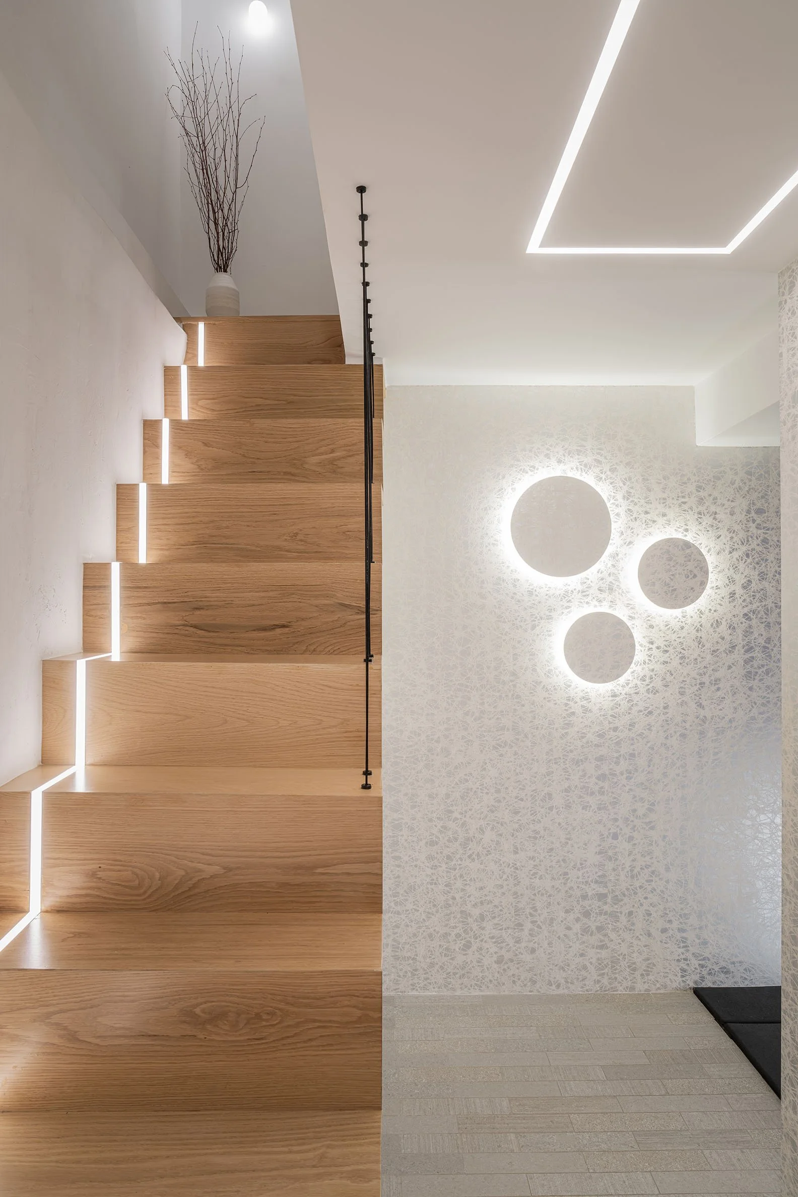 modern-interior-home-gym-custom-stairs-led-lighting-wallpaper-trevor-fulmer-design.jpg