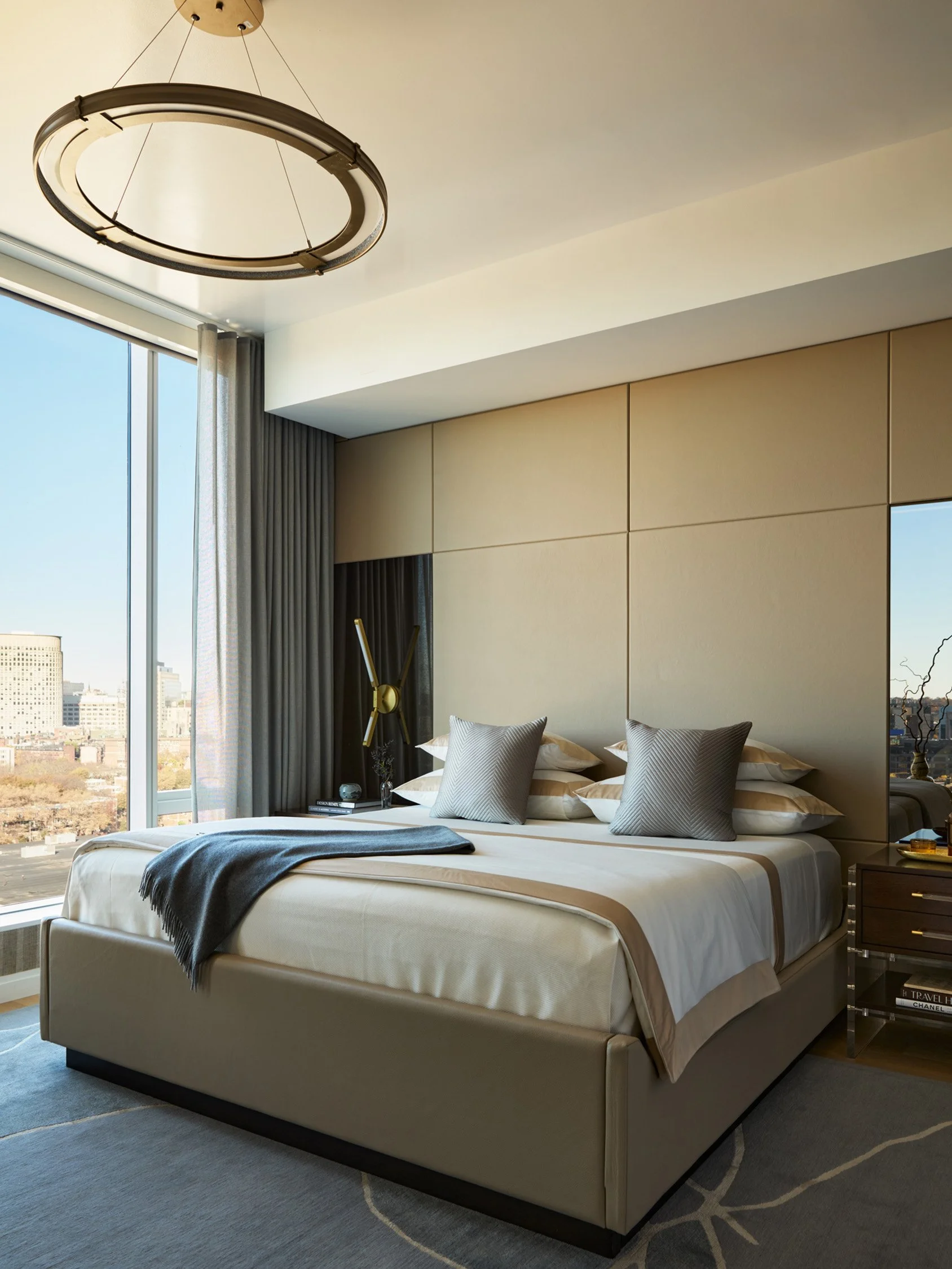 Skyline sophistication primary bedroom custom furniture and rugs interior design by Trevor Fulmer