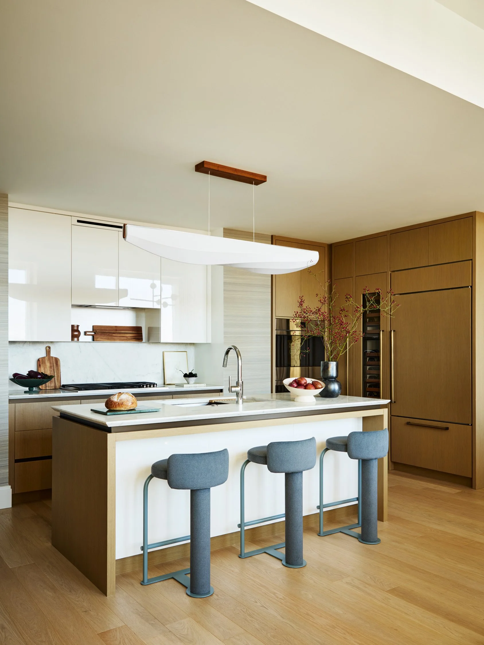Skyline sophistication kitchen with wood and white cabinets interior design by Trevor Fulmer
