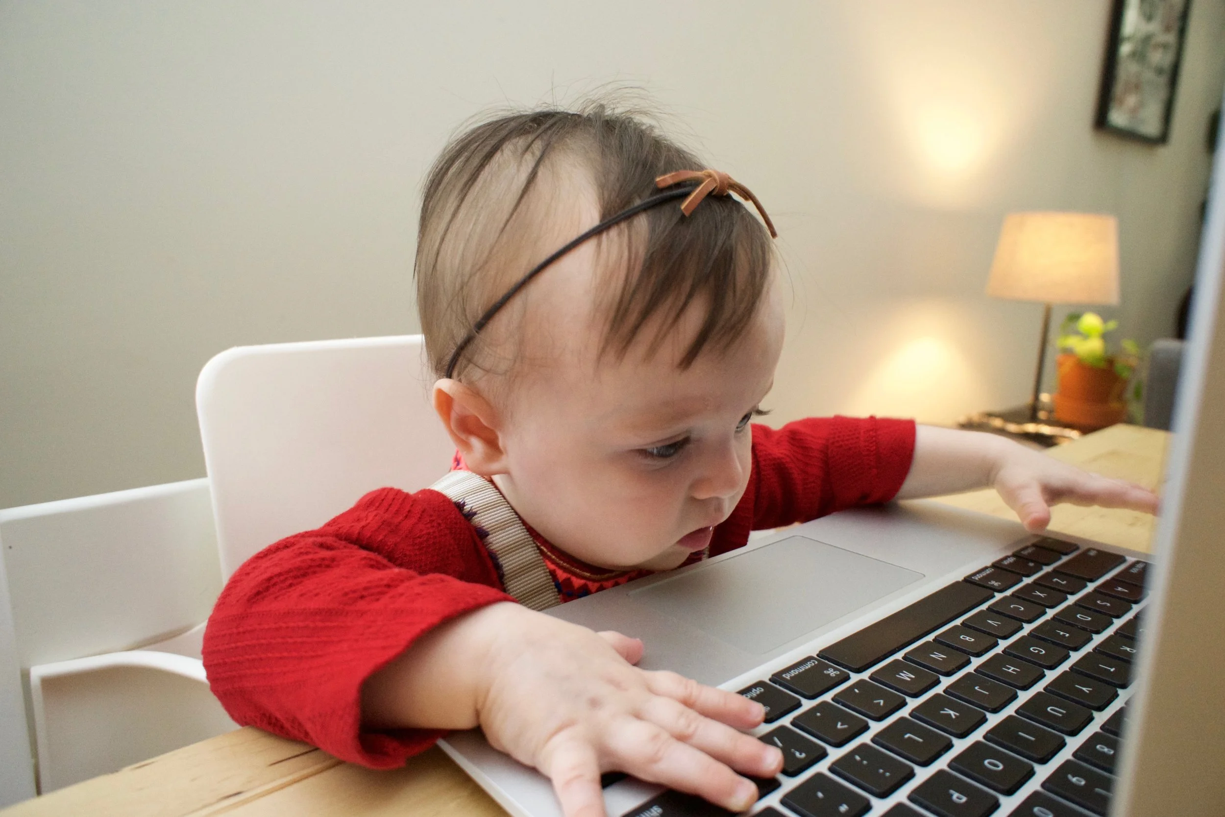 stock-photo-laptop-with-stack-of-folders-on-table-on-white-background-320717660-1.jpg
