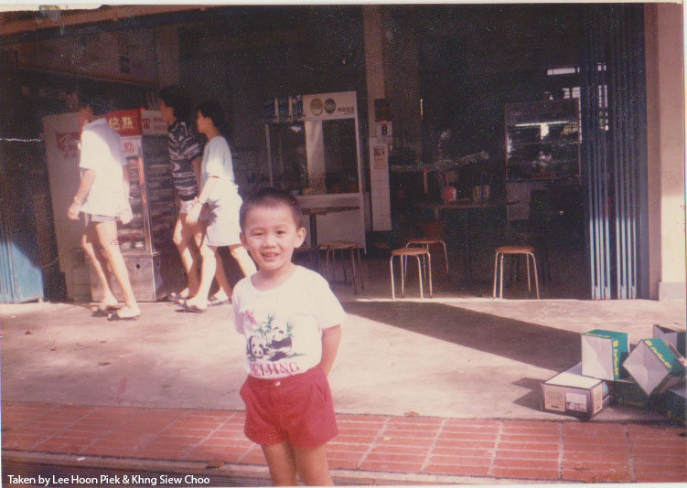 My elder brother at Neo Tiew Village's coffeeshop. It is only photo we have of the place.