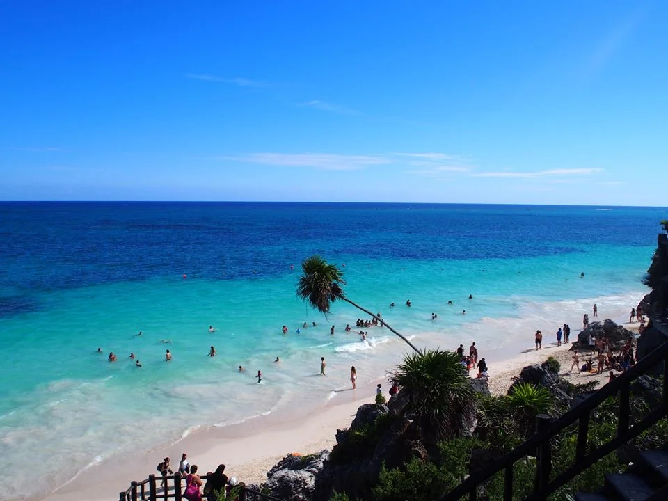 View of the Caribbean and the white sandy beach from the ruins
