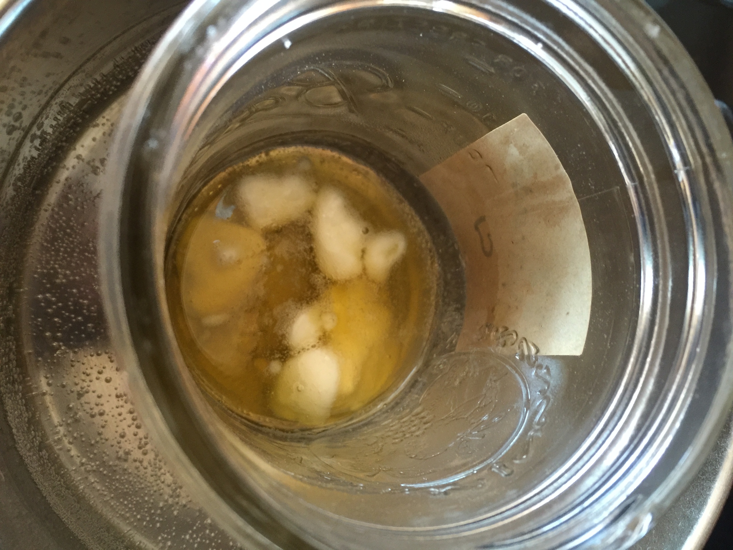 Here you see the oils melting, and notice the water is barely at a simmer.